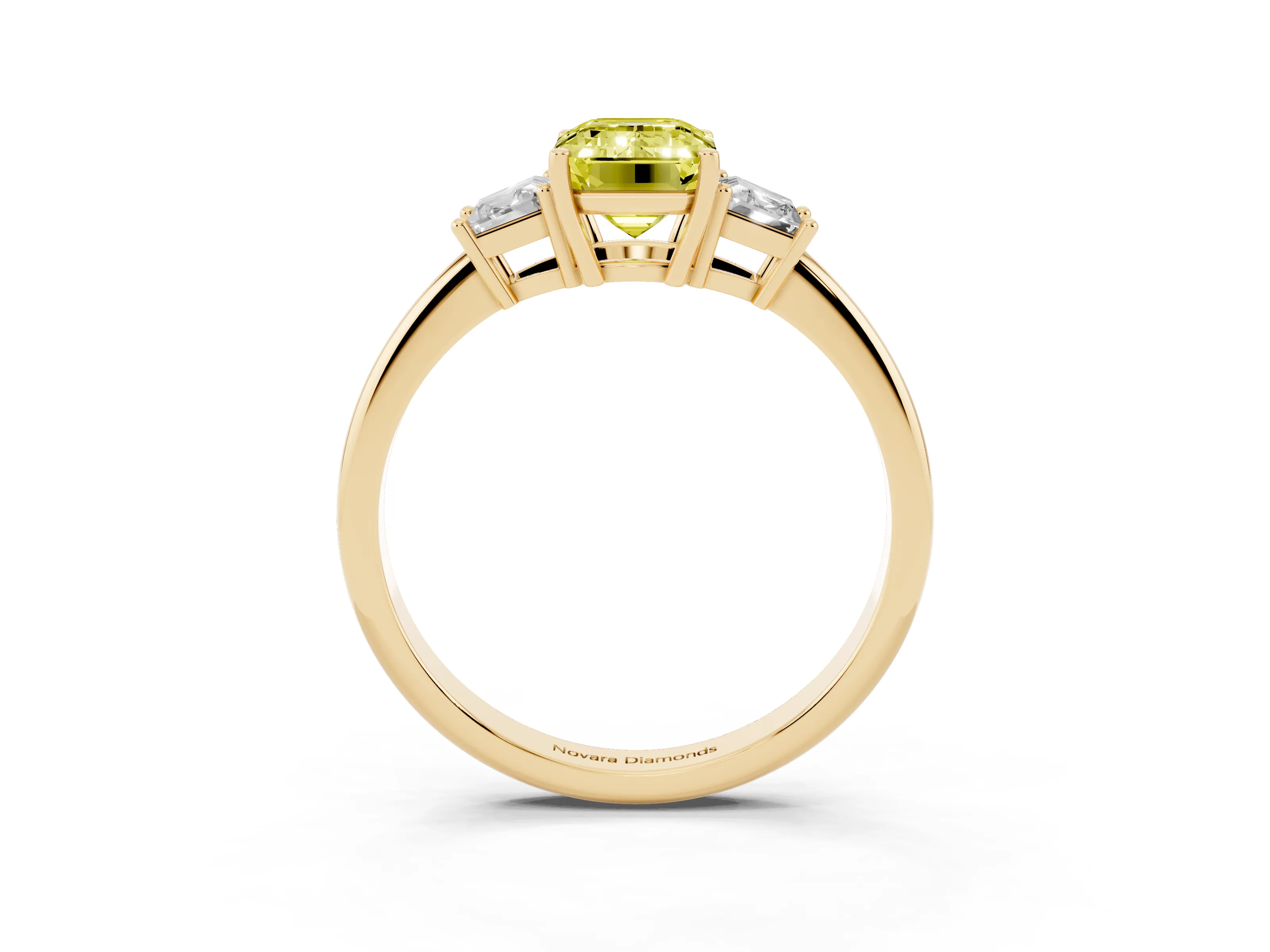 Fancy Yellow Emerald Cut Diamond Three-Stone Ring Set in Yellow gold with Trapezoid Side Stones and Prong Setting