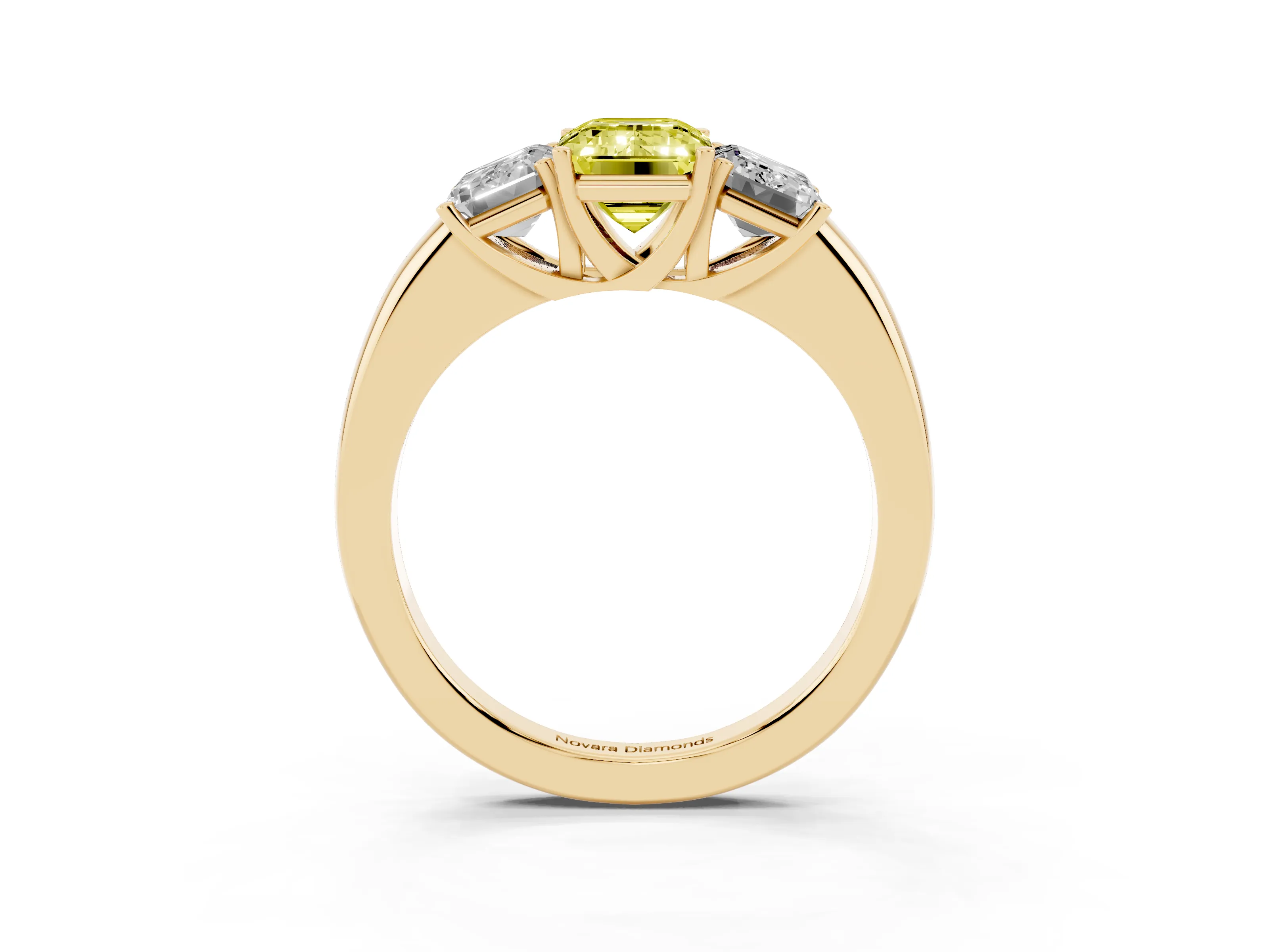 Fancy Yellow Emerald Cut Diamond Three-Stone Ring Set in Yellow gold with Bold Center and Classic Band