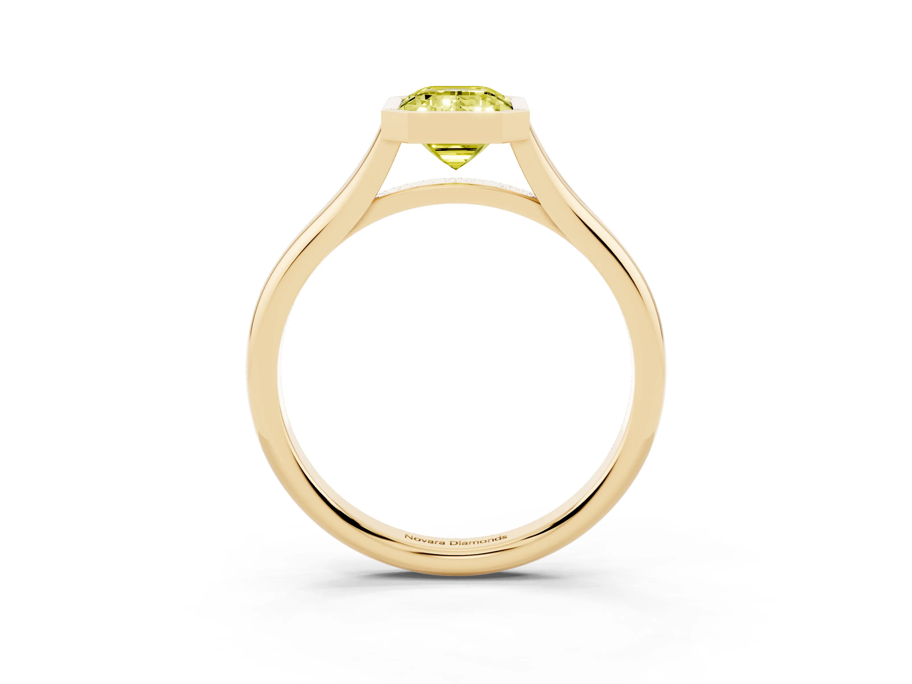 Fancy Yellow Bezel Set Emerald Cut Diamond Solitaire Ring Set in Yellow gold with Tapered Band