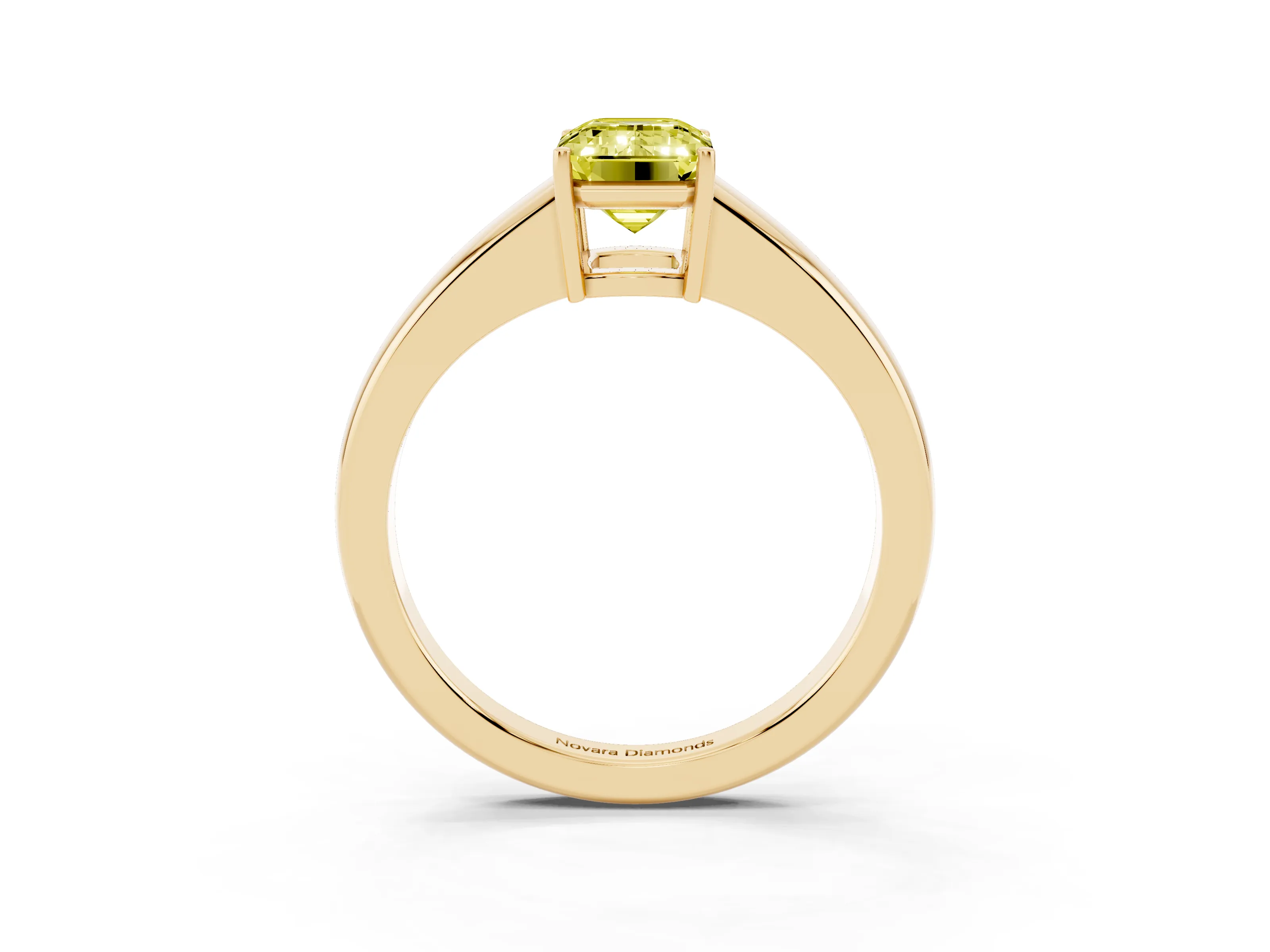 Fancy Yellow Emerald Cut Diamond Solitaire Ring Set in Yellow gold with Tapered Band and Prong Setting