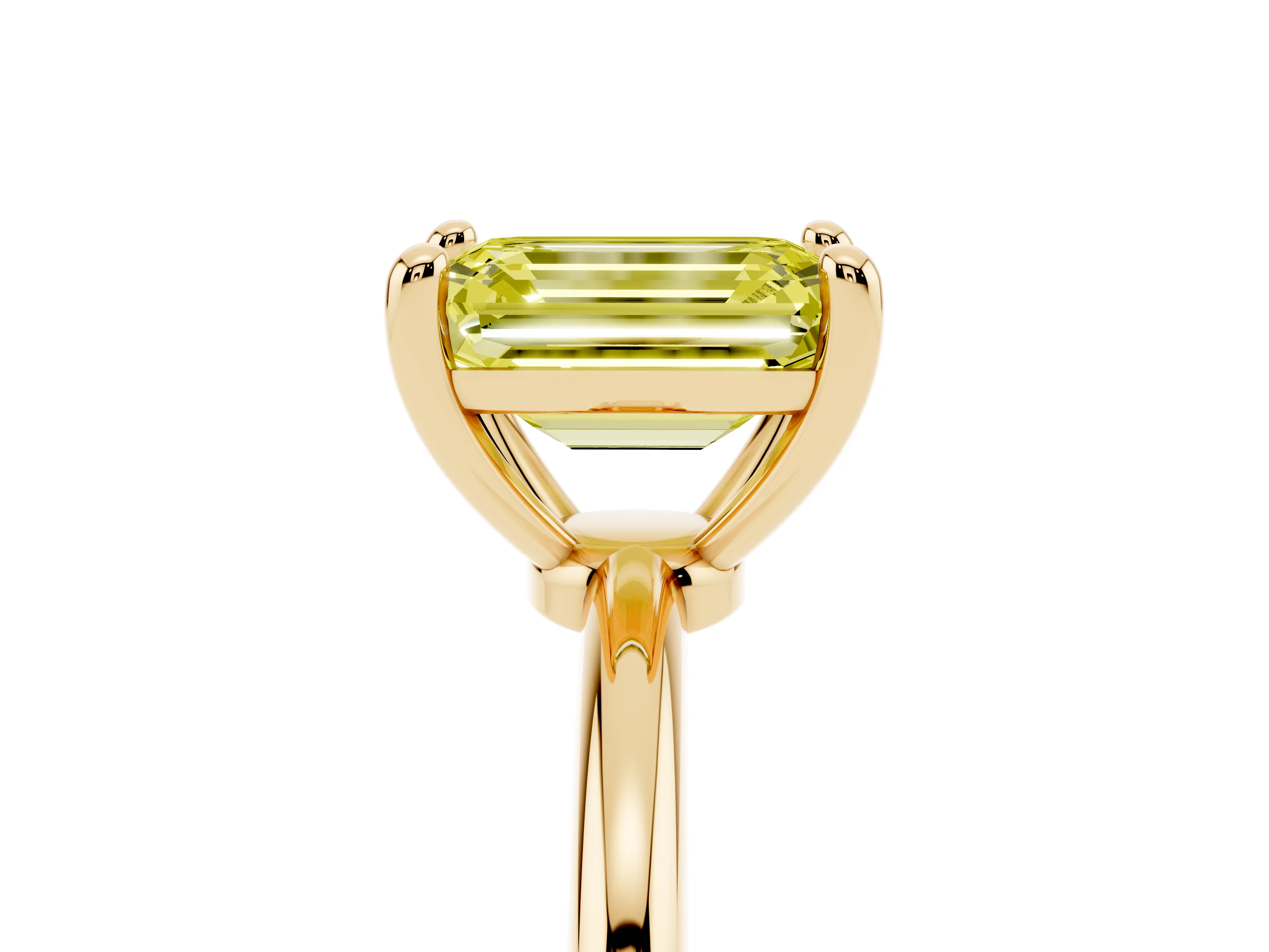 Fancy Yellow Emerald Cut Diamond Solitaire Ring Set in Yellow gold with Secure Prong Setting on a Classic Band