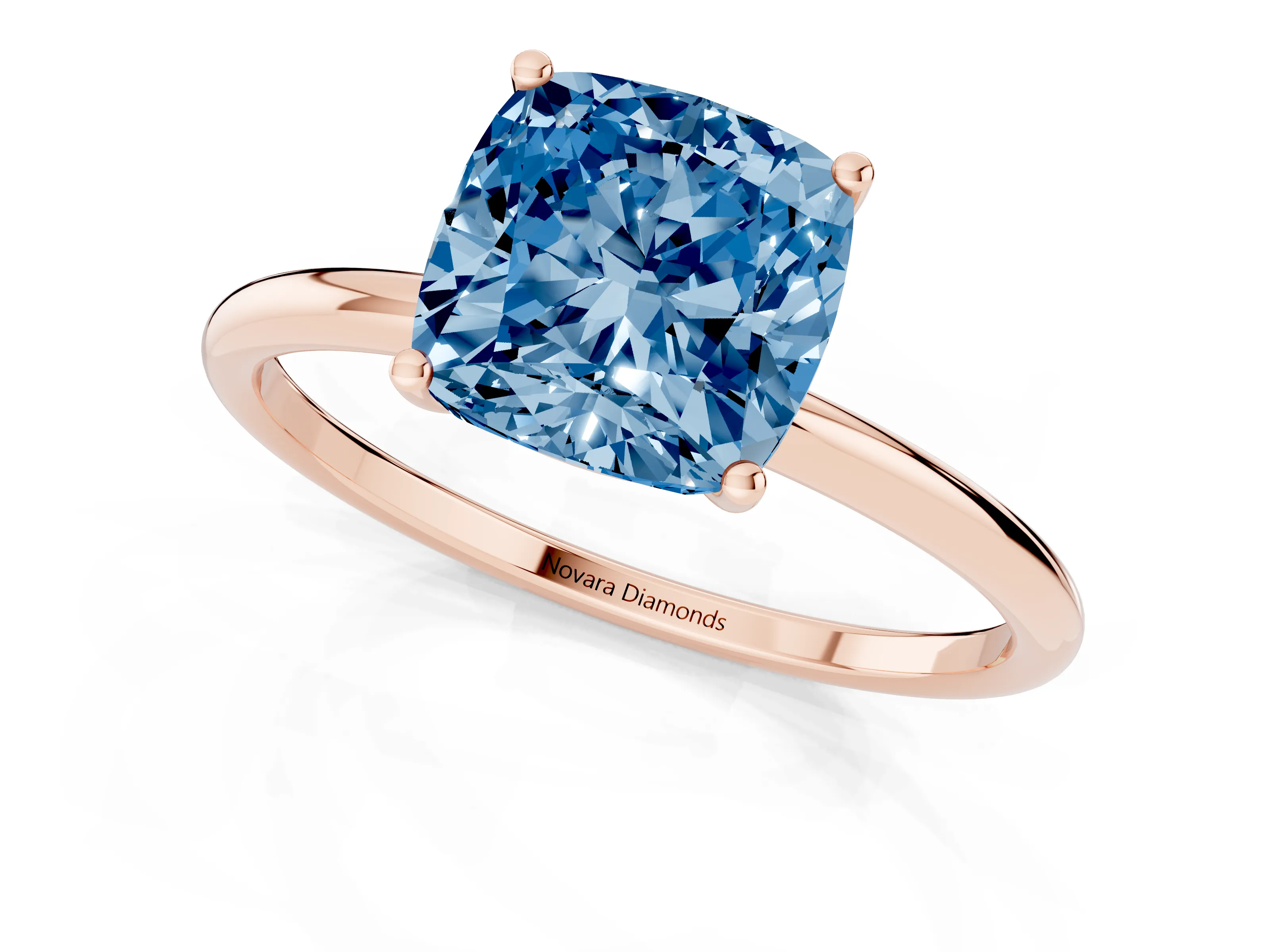 Fancy Blue Cushion Cut Diamond Solitaire Engagement Ring Set in Rose gold with Thin Band and Prong Setting