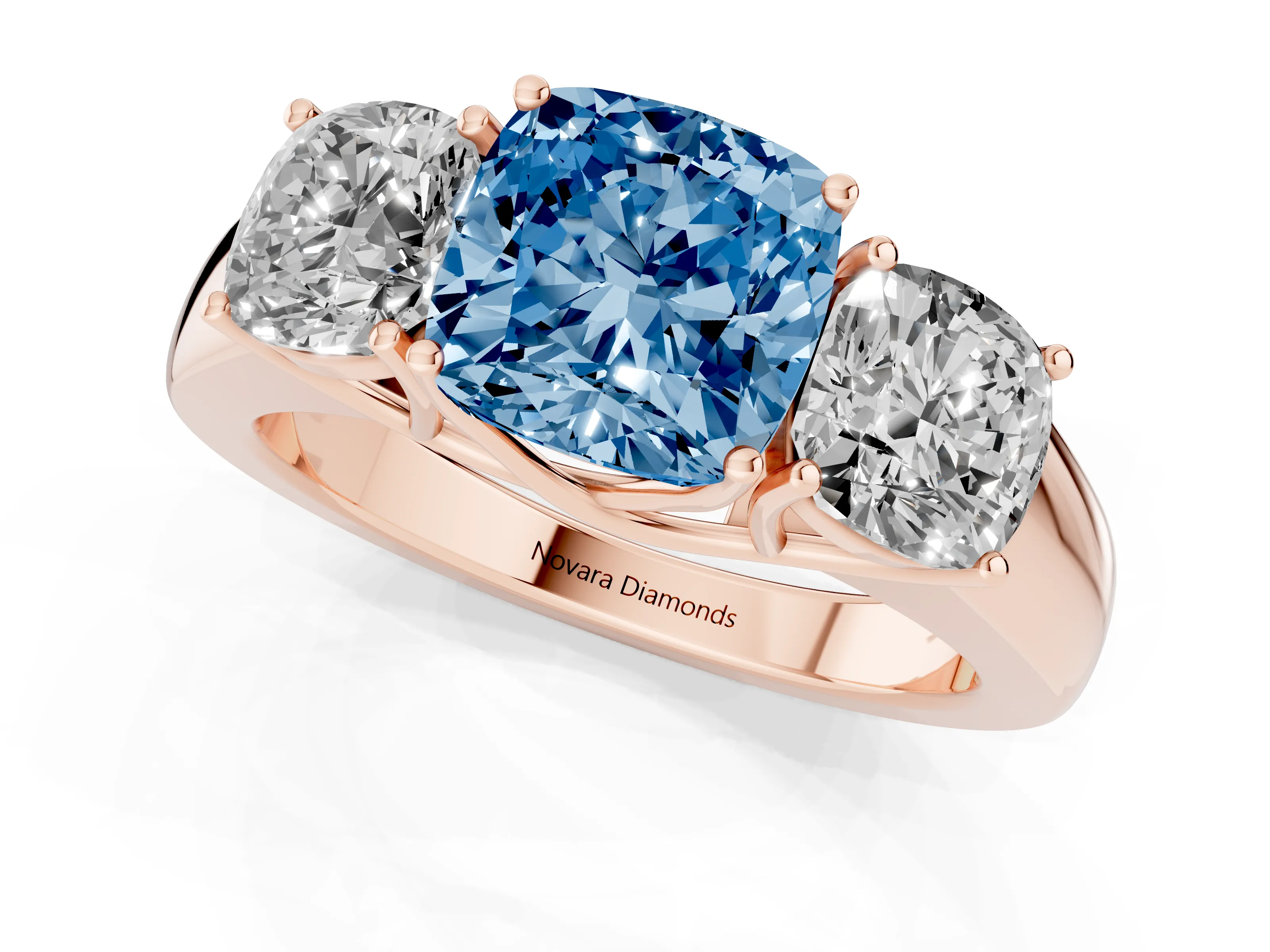 Fancy Blue Three-Stone Cushion Cut Diamond Ring Set in Rose gold with Matching Prong Settings and Plain Band