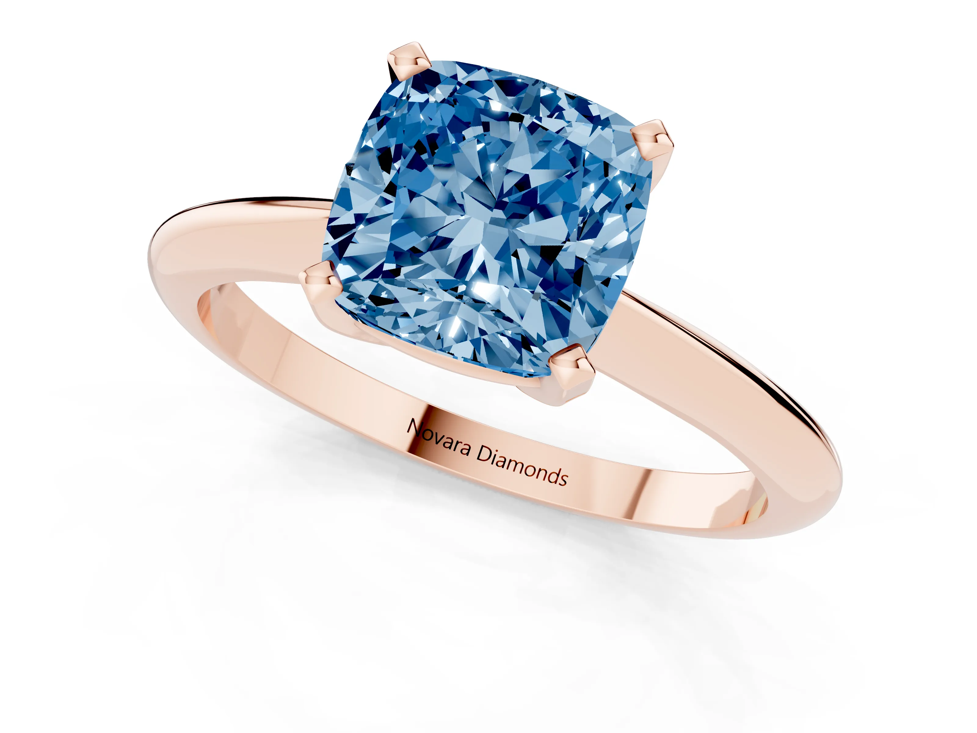 Fancy Blue Cushion Cut Diamond Solitaire Ring Set in Rose gold with Prong Setting on a Plain Round Band