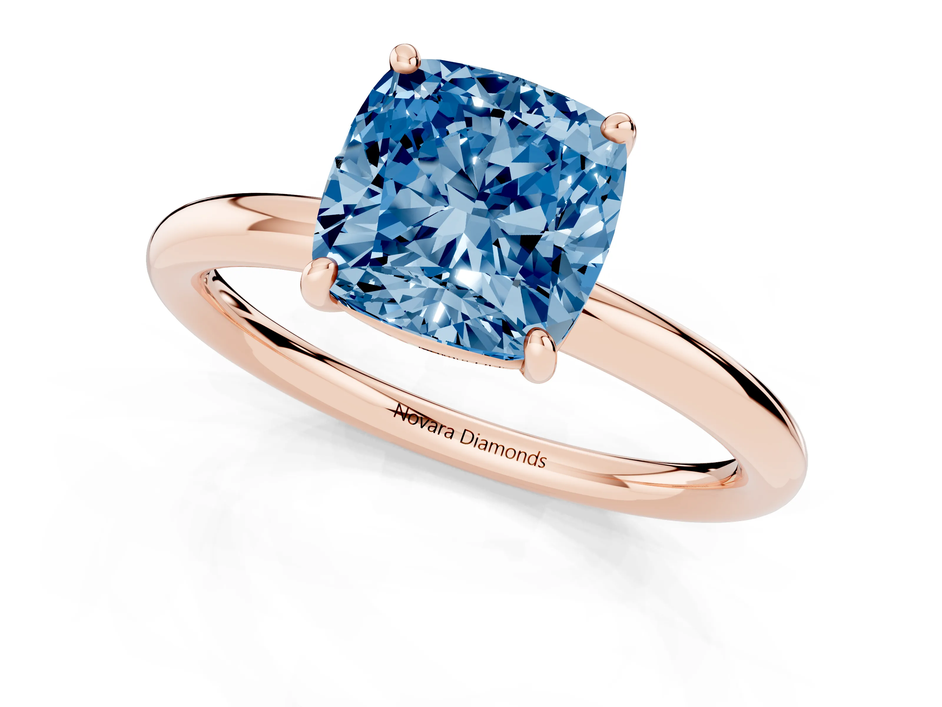 Fancy Blue Cushion Cut Diamond Solitaire Ring Set in Rose gold with Prong Setting on a Polished Plain Band