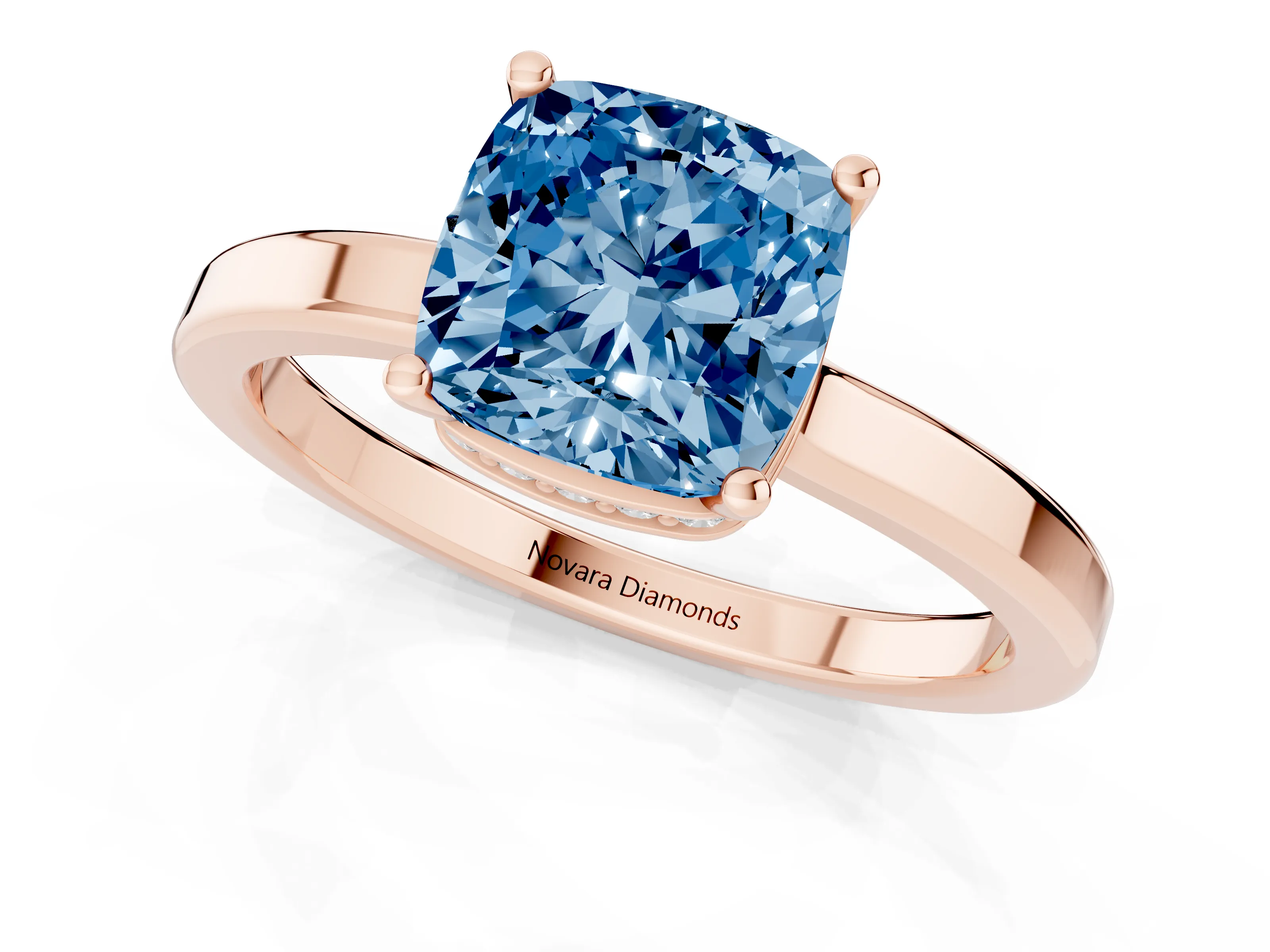 Fancy Blue Cushion Cut Diamond Solitaire Engagement Ring Set in Rose gold with Prong Setting on a Plain Band