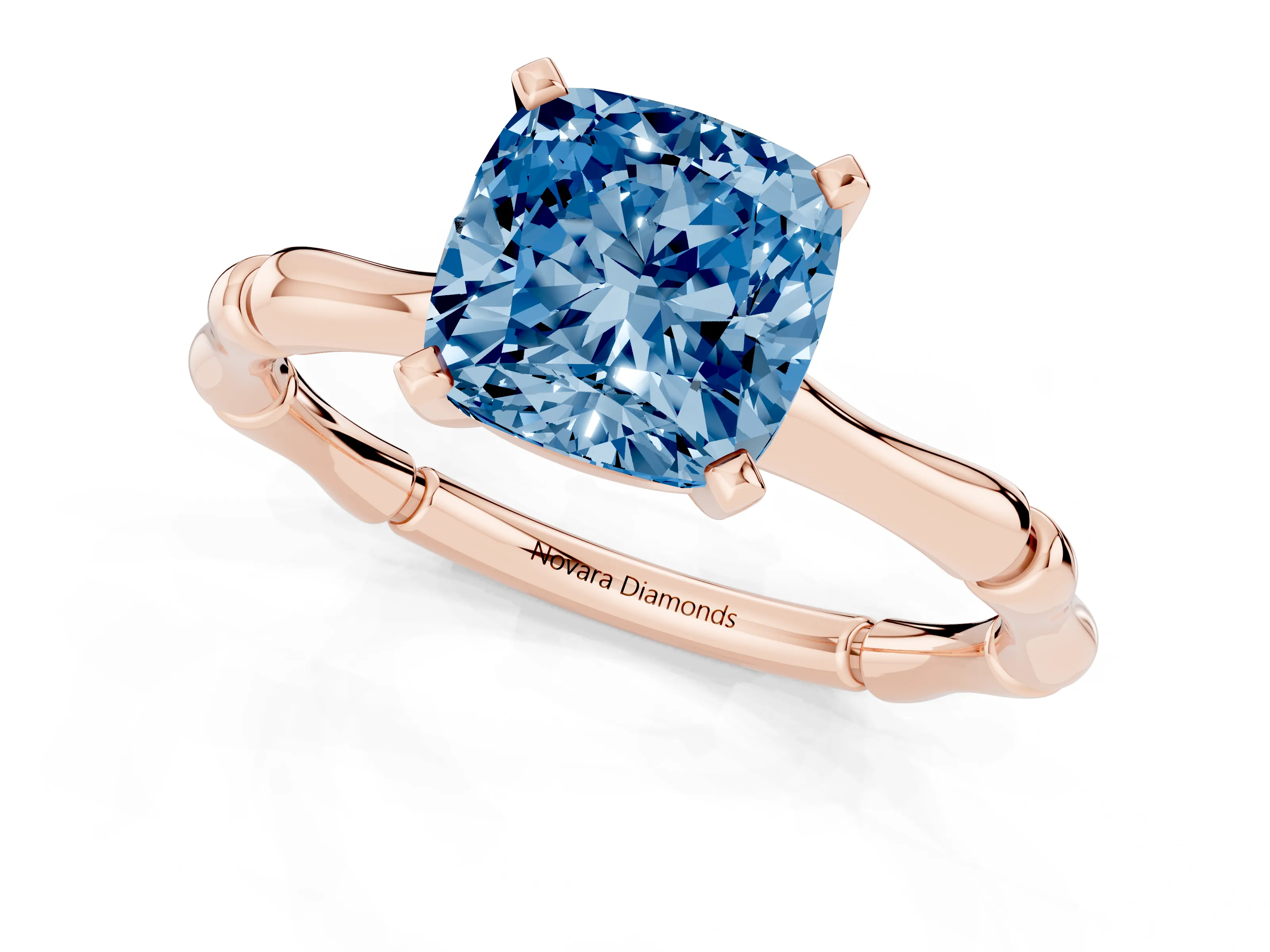Fancy Blue Cushion Cut Diamond Solitaire Ring Set in Rose gold with Bamboo Band and Prong Setting