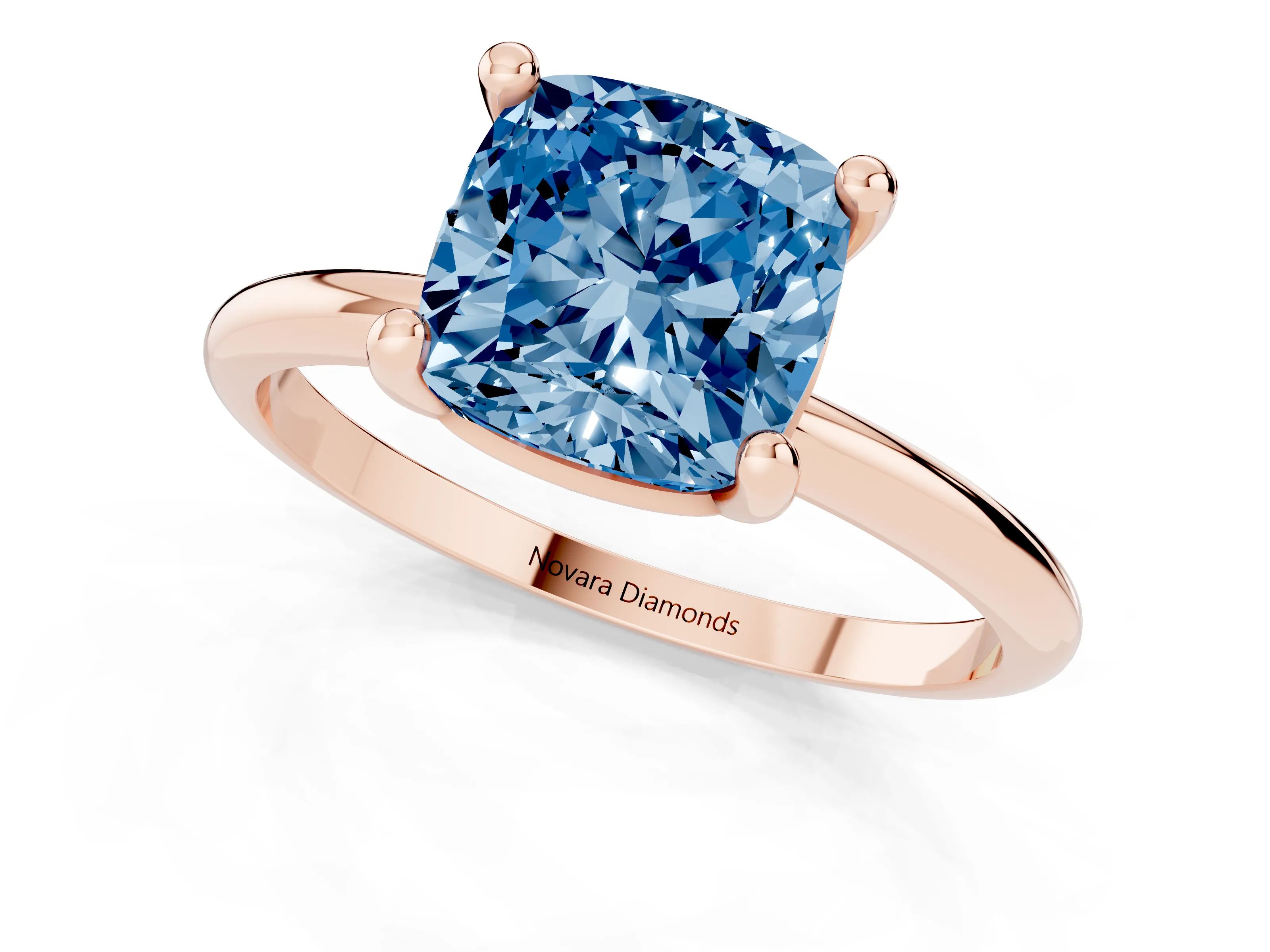 Fancy Blue Cushion Cut Diamond Solitaire Ring Set in Rose gold with Secure Prong Setting on a Classic Band