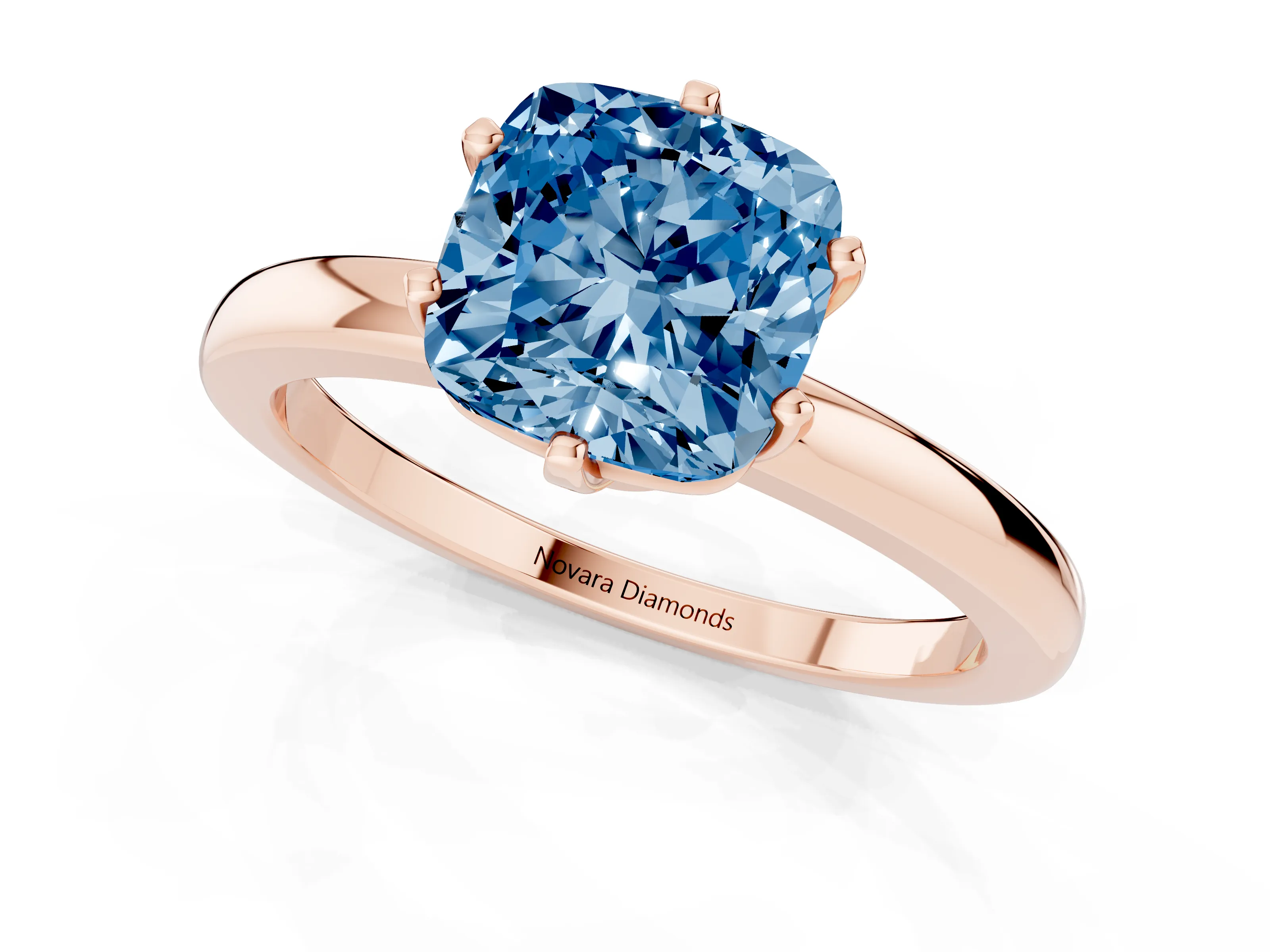 Fancy Blue Cushion Cut Diamond Solitaire Ring Set in Rose gold with Raised Prong Setting on a Classic Band