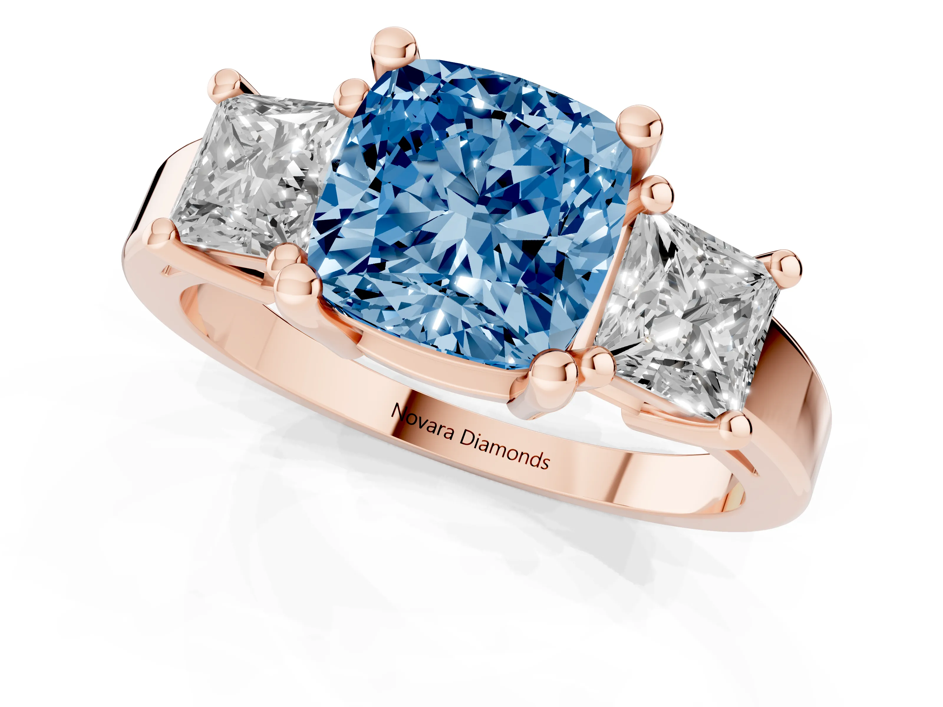 Fancy Blue Three-Stone Cushion Cut Diamond Solitaire Ring Set in Rose gold with Prong Setting