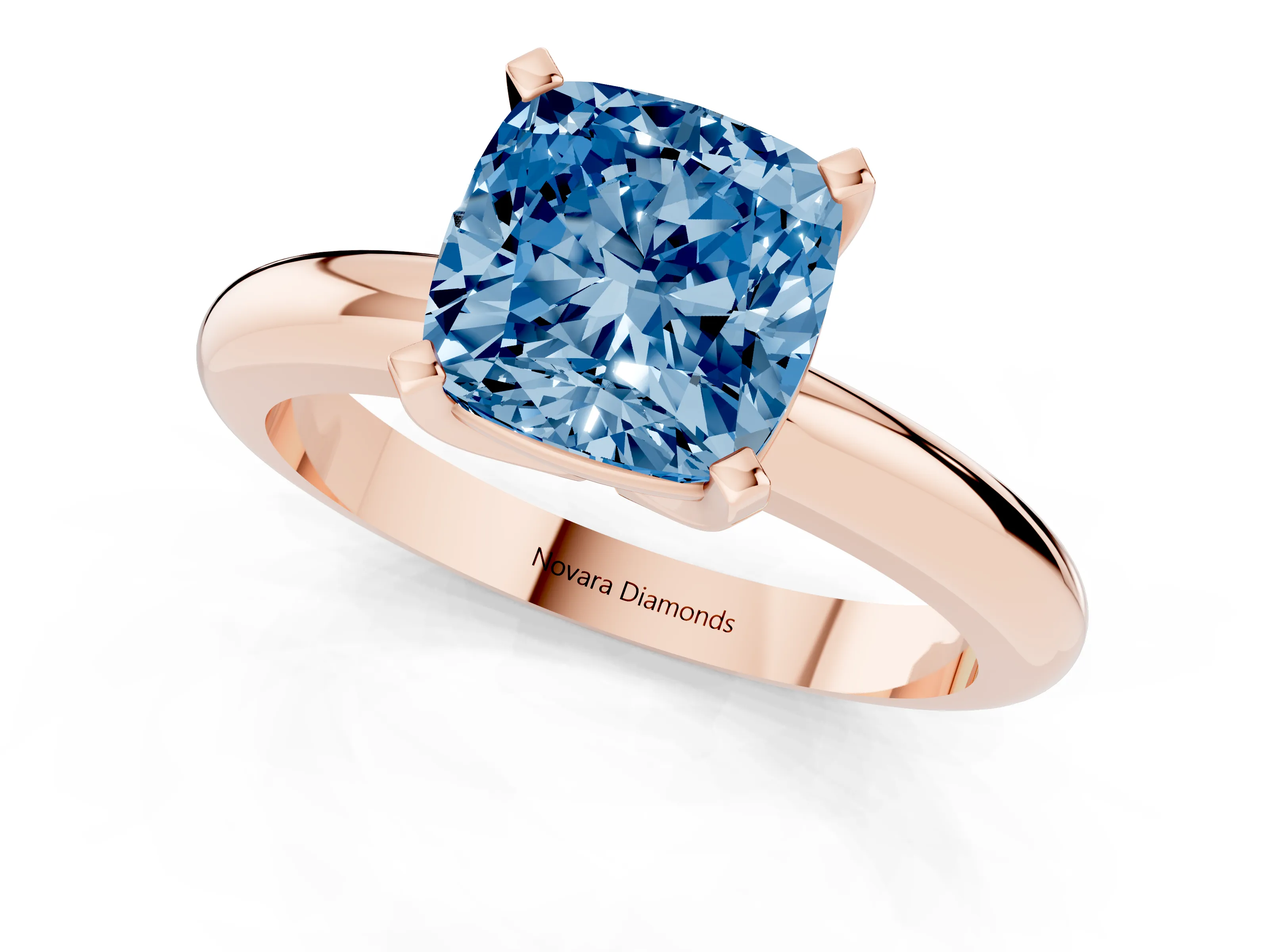 Fancy Blue Cushion Cut Diamond Solitaire Engagement Ring Set in Rose gold with Round Band and Prong Setting