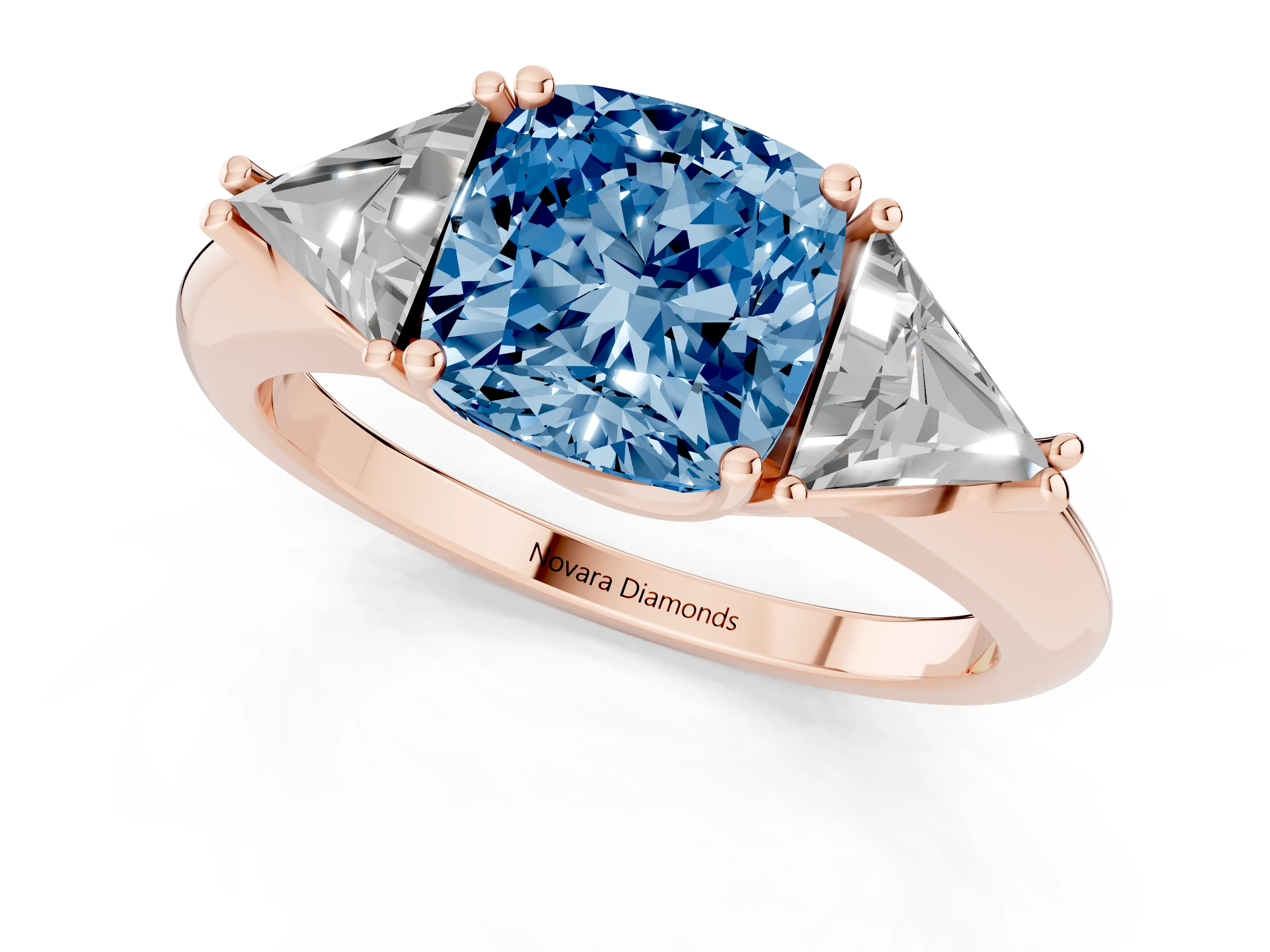 Fancy Blue Cushion Cut Diamond Three-Stone Engagement Ring Set in Rose gold with Trillion Side Stones