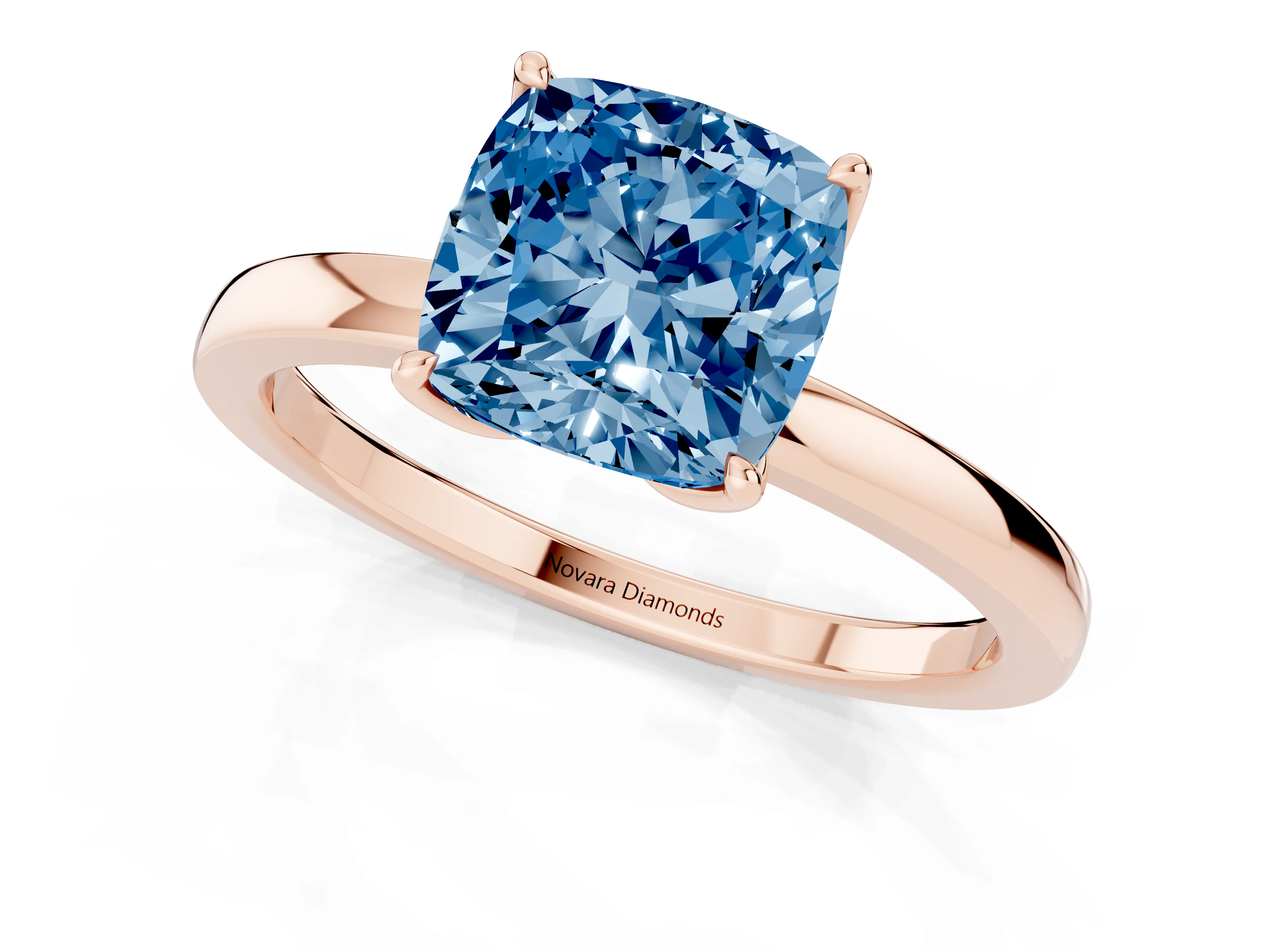 Fancy Blue Cushion Cut Diamond Solitaire Ring Set in Rose gold with Prong Setting and Thin Polished Band