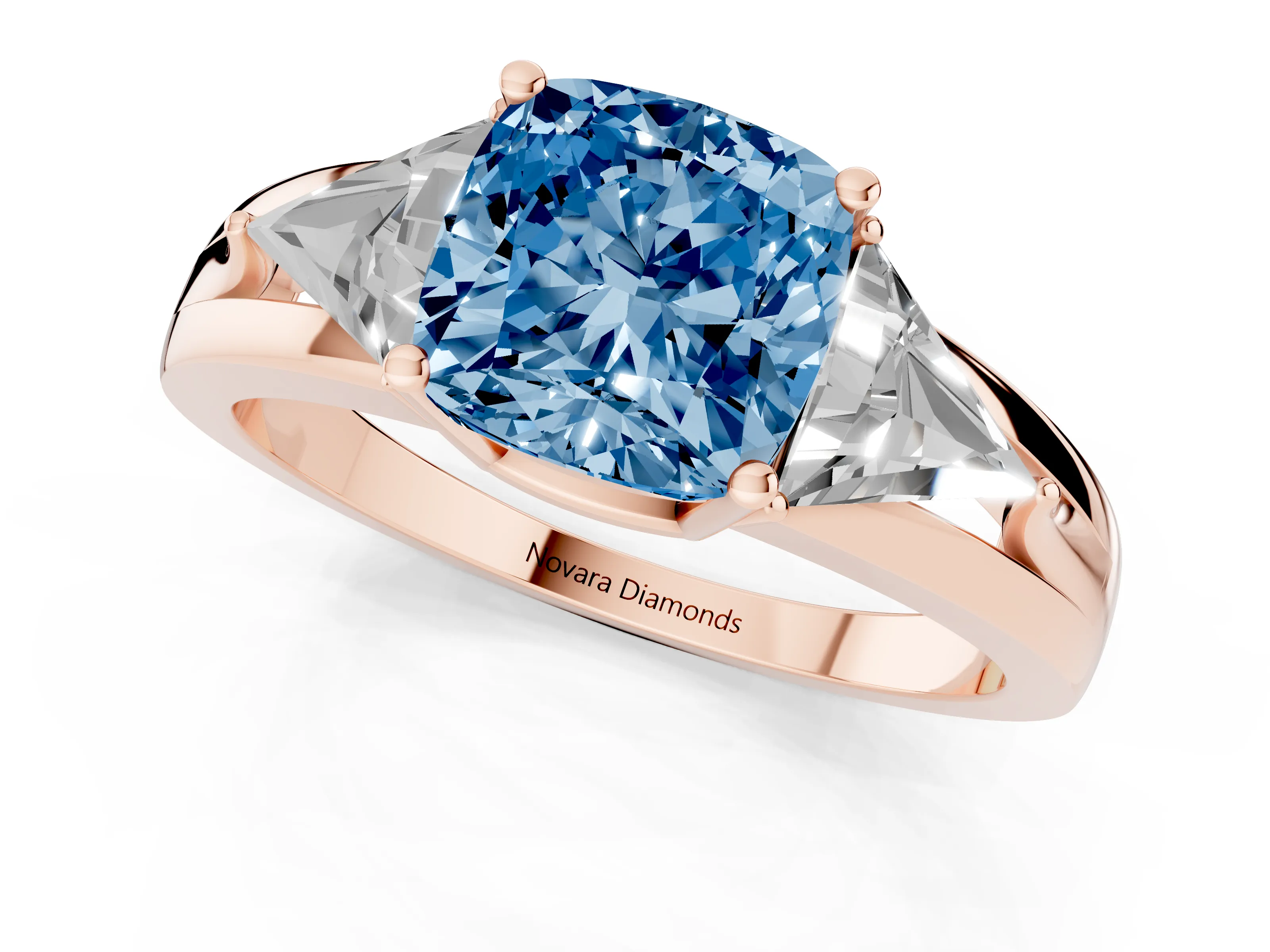 Fancy Blue Cushion Cut Diamond Three-Stone Ring Set in Rose gold with Trillion Side Stones and Split Shank