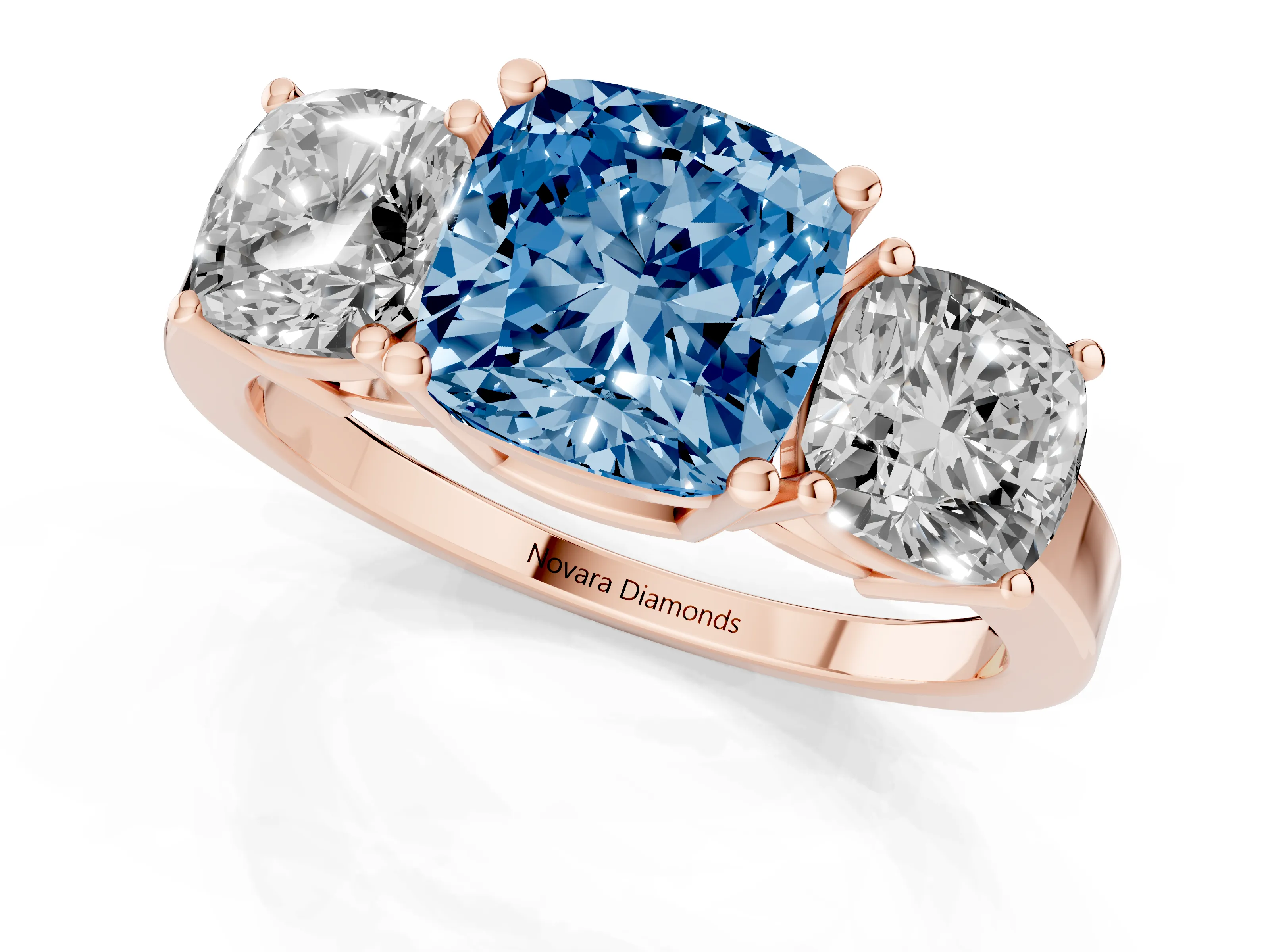 Fancy Blue Cushion Cut Diamond Three-Stone Engagement Ring Set in Rose gold with Flat Band
