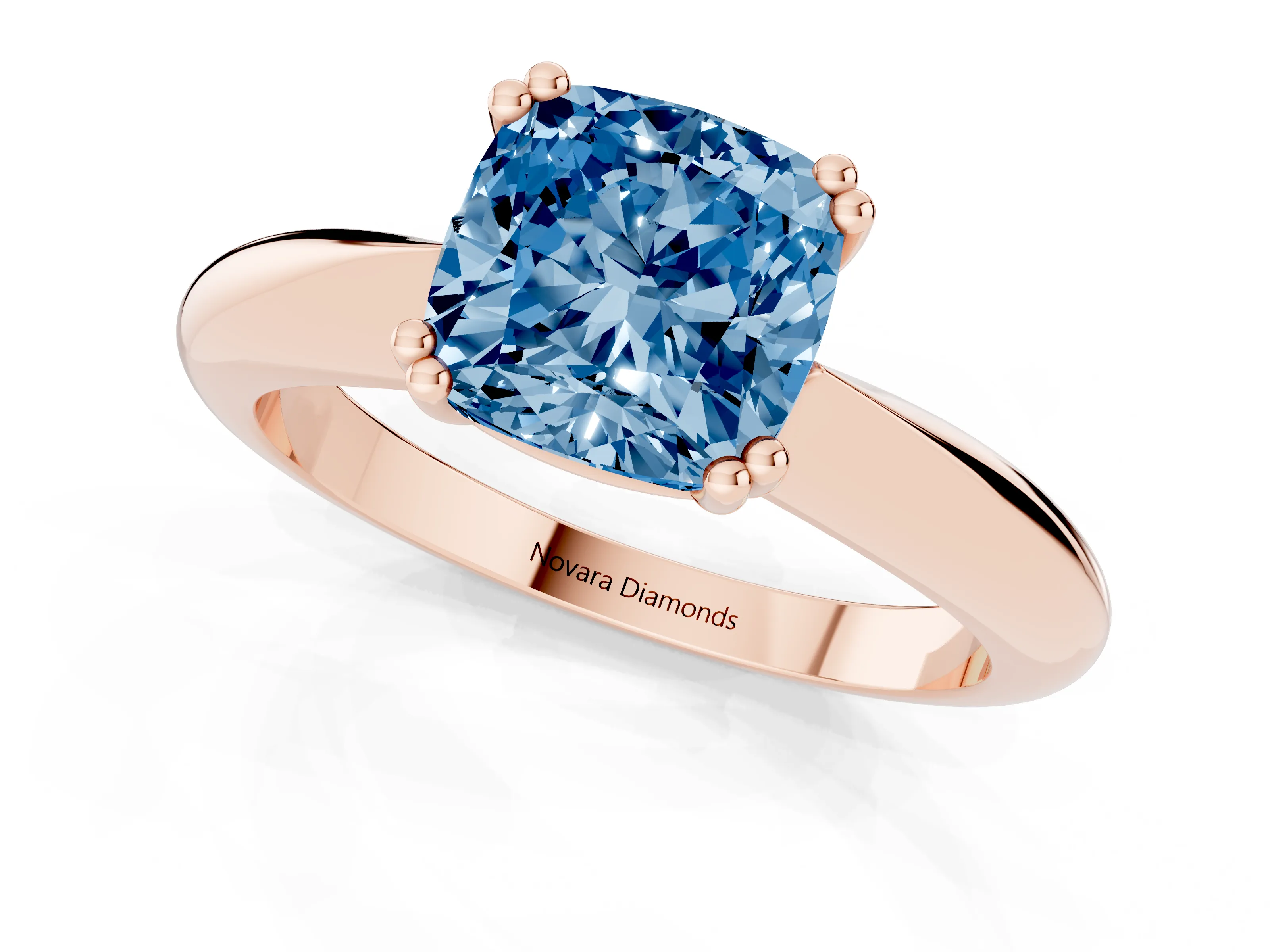 Fancy Blue Cushion Cut Diamond Solitaire Engagement Ring Set in Rose gold with Tapered Band and Prong Setting