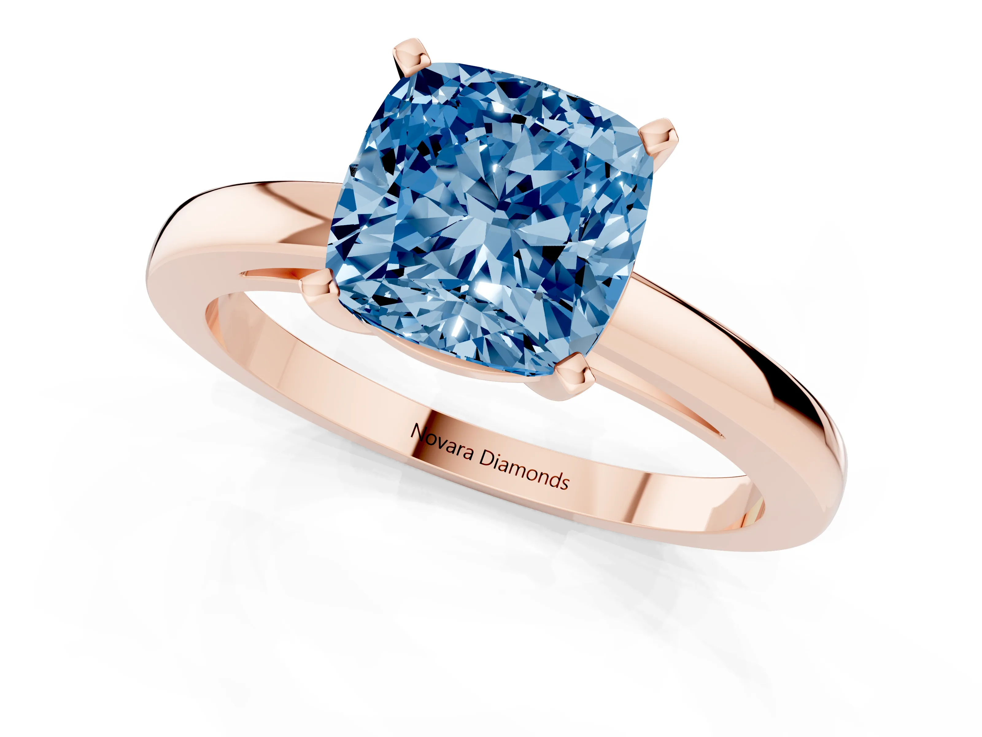 Fancy Blue Cushion Cut Diamond Solitaire Engagement Ring Set in Rose gold with Prong Setting on a Classic Band