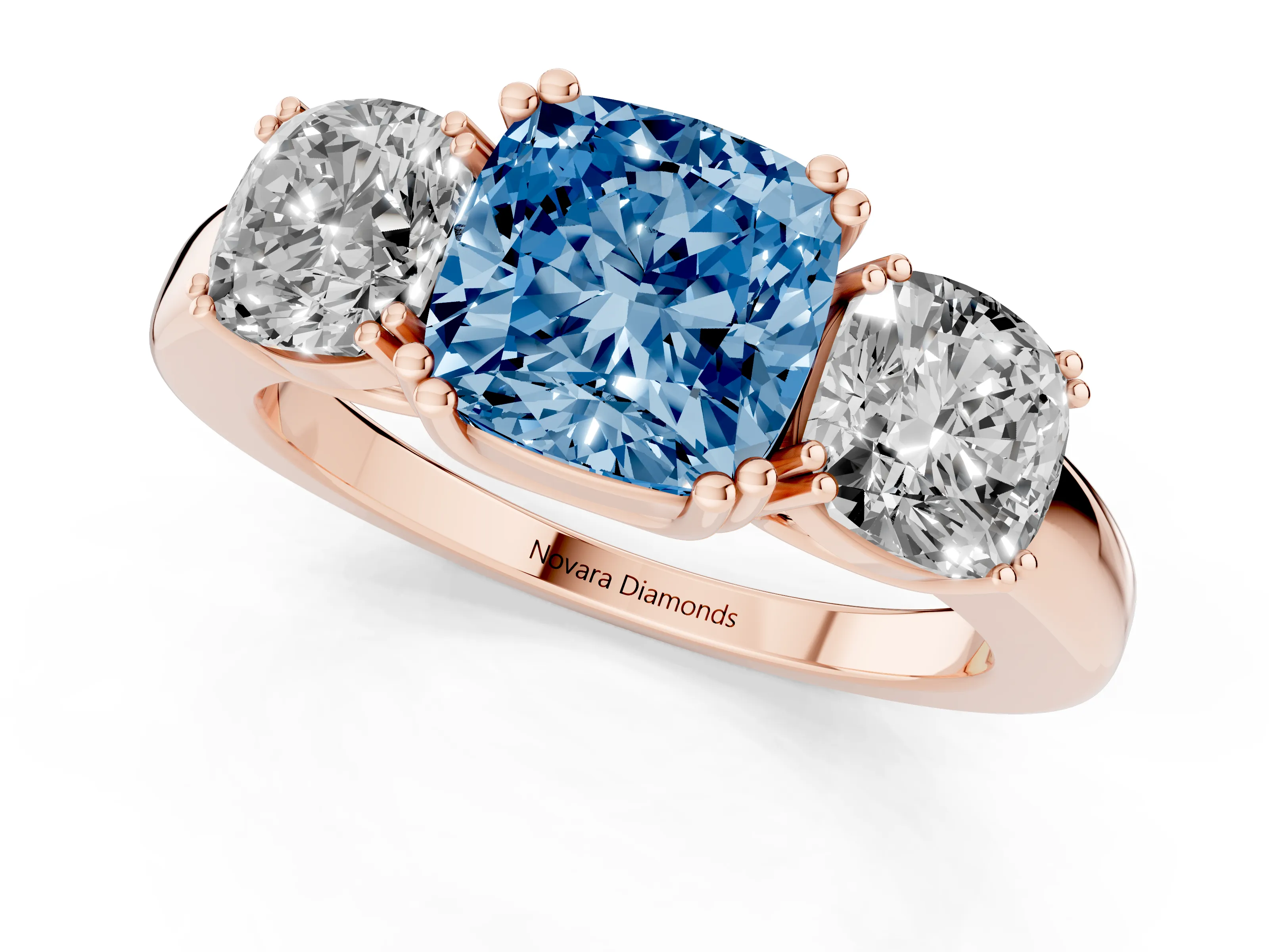 Fancy Blue Cushion Cut Diamond Three-Stone Ring Set in Rose gold with Polished Band and Prong Setting