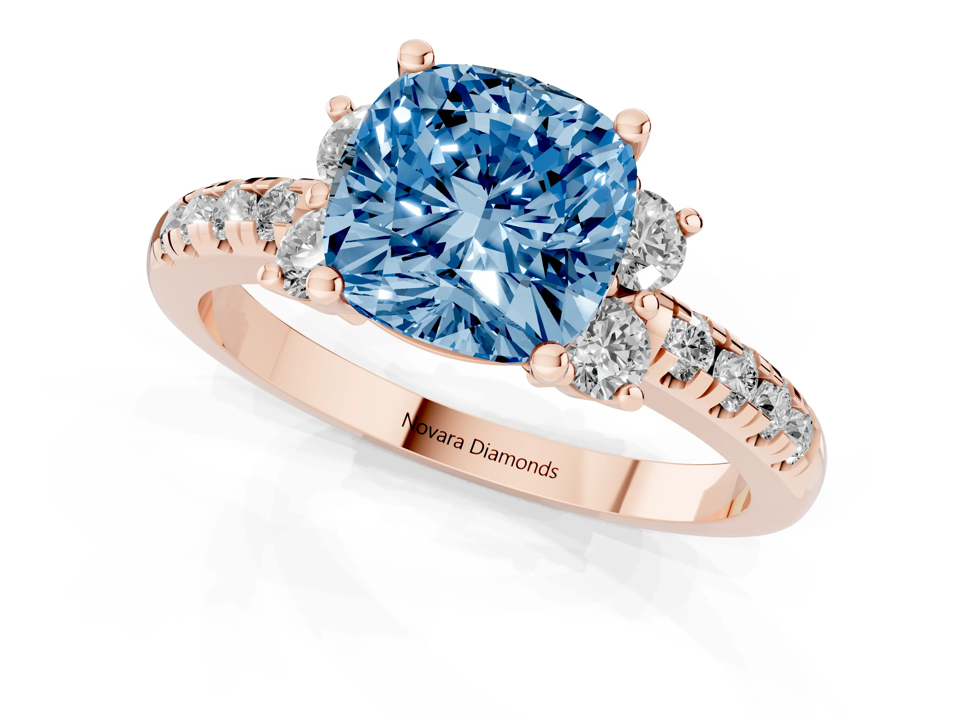 Fancy Blue Cushion Cut Diamond Three-Stone Pavé Ring Set in Rose gold with Prong Setting