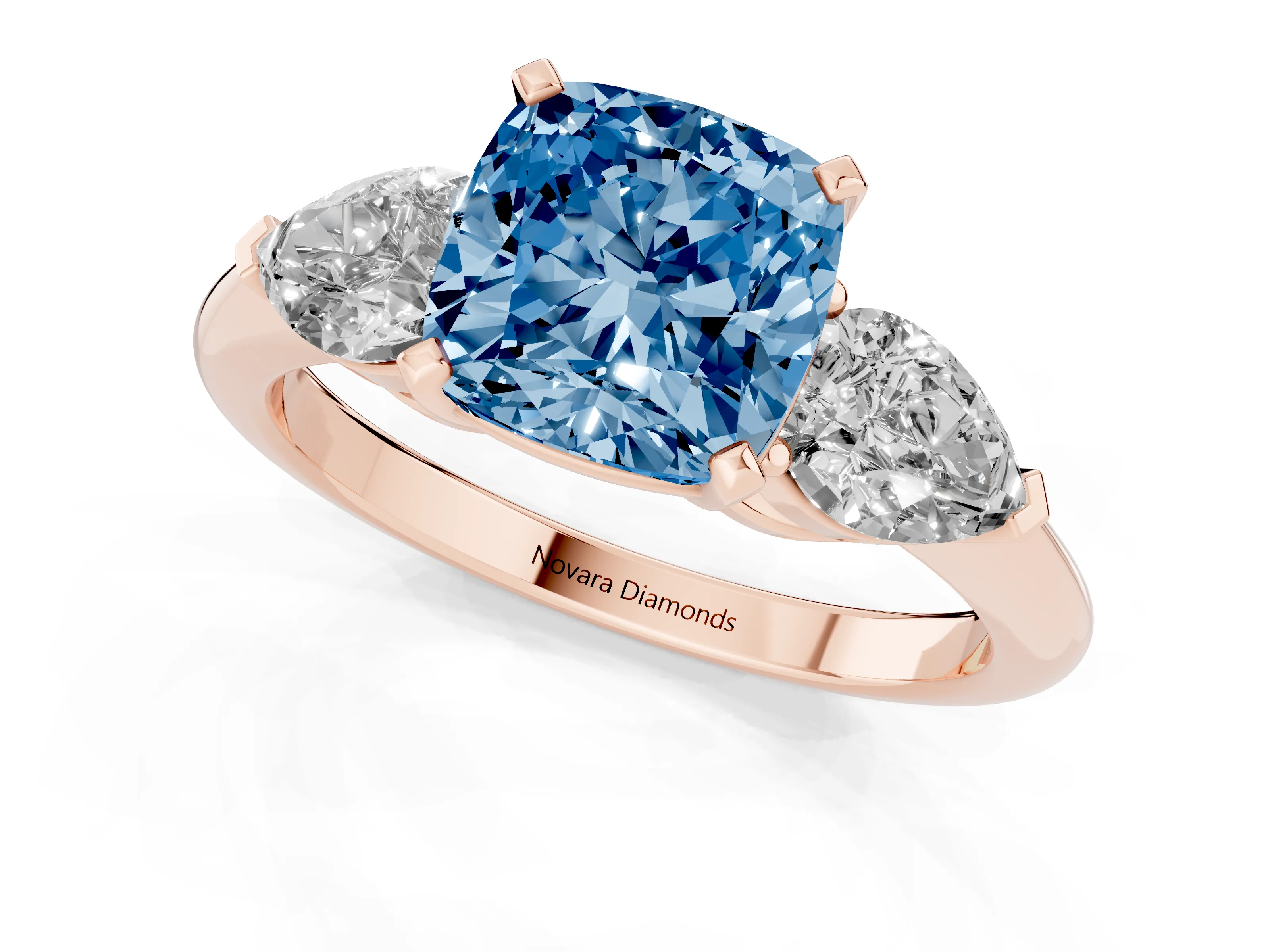 Fancy Blue Three-Stone Cushion Cut Diamond Ring Set in Rose gold with Pear Side Stones and Prong Setting