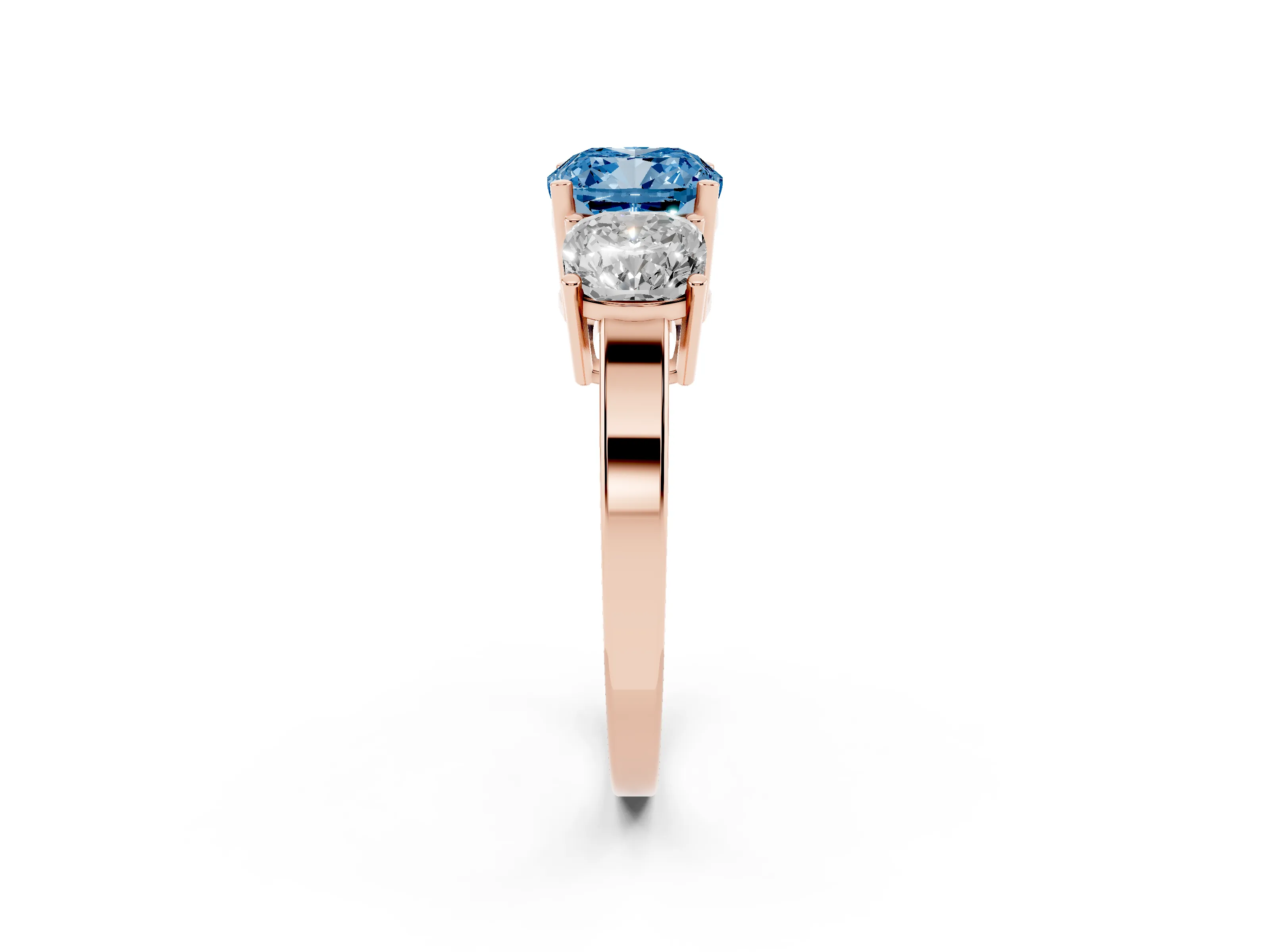 Fancy Blue Cushion Cut Diamond Three-Stone Engagement Ring Set in Rose gold with Flat Band