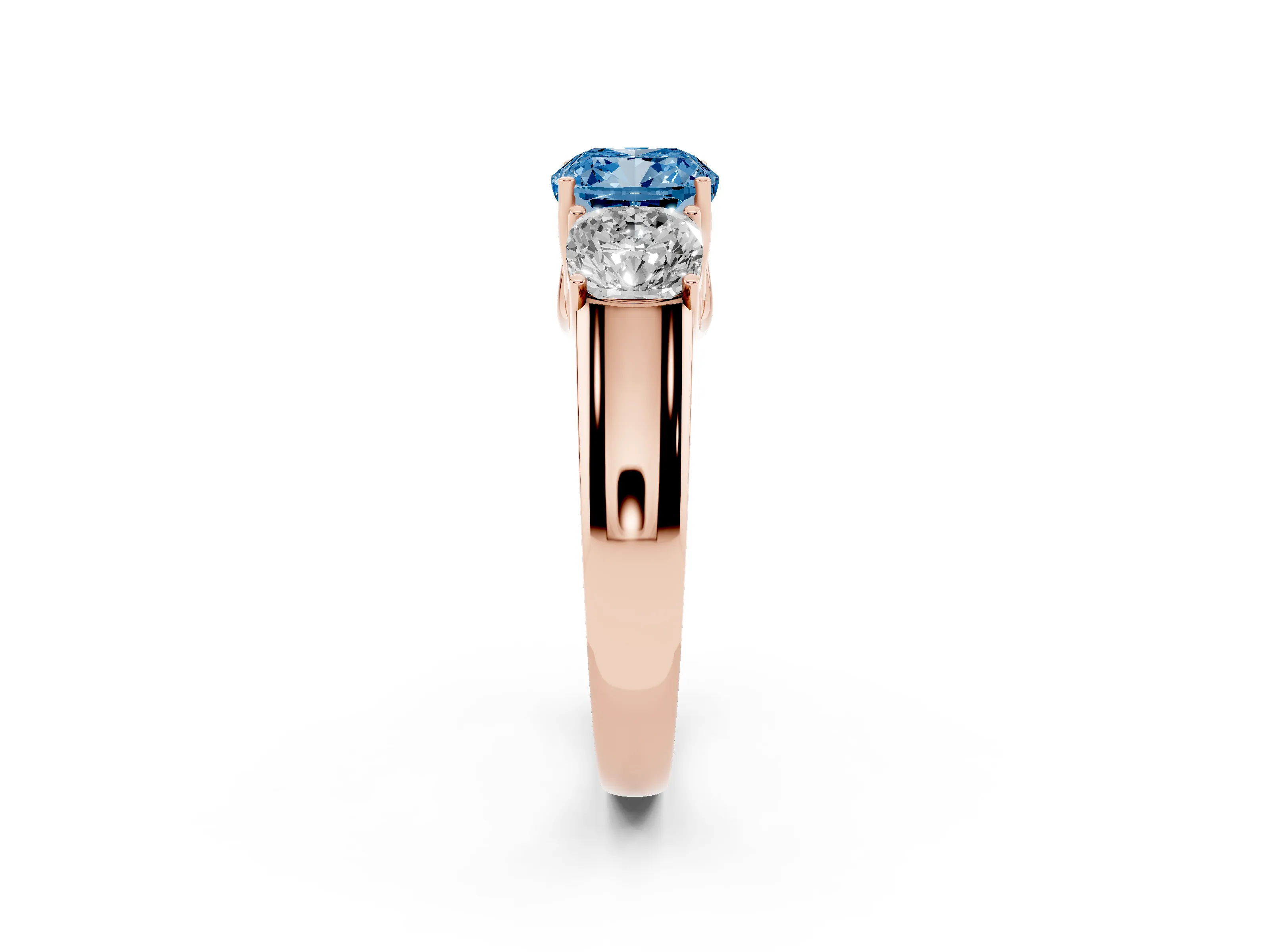Fancy Blue Three-Stone Cushion Cut Diamond Ring Set in Rose gold with Matching Prong Settings and Plain Band