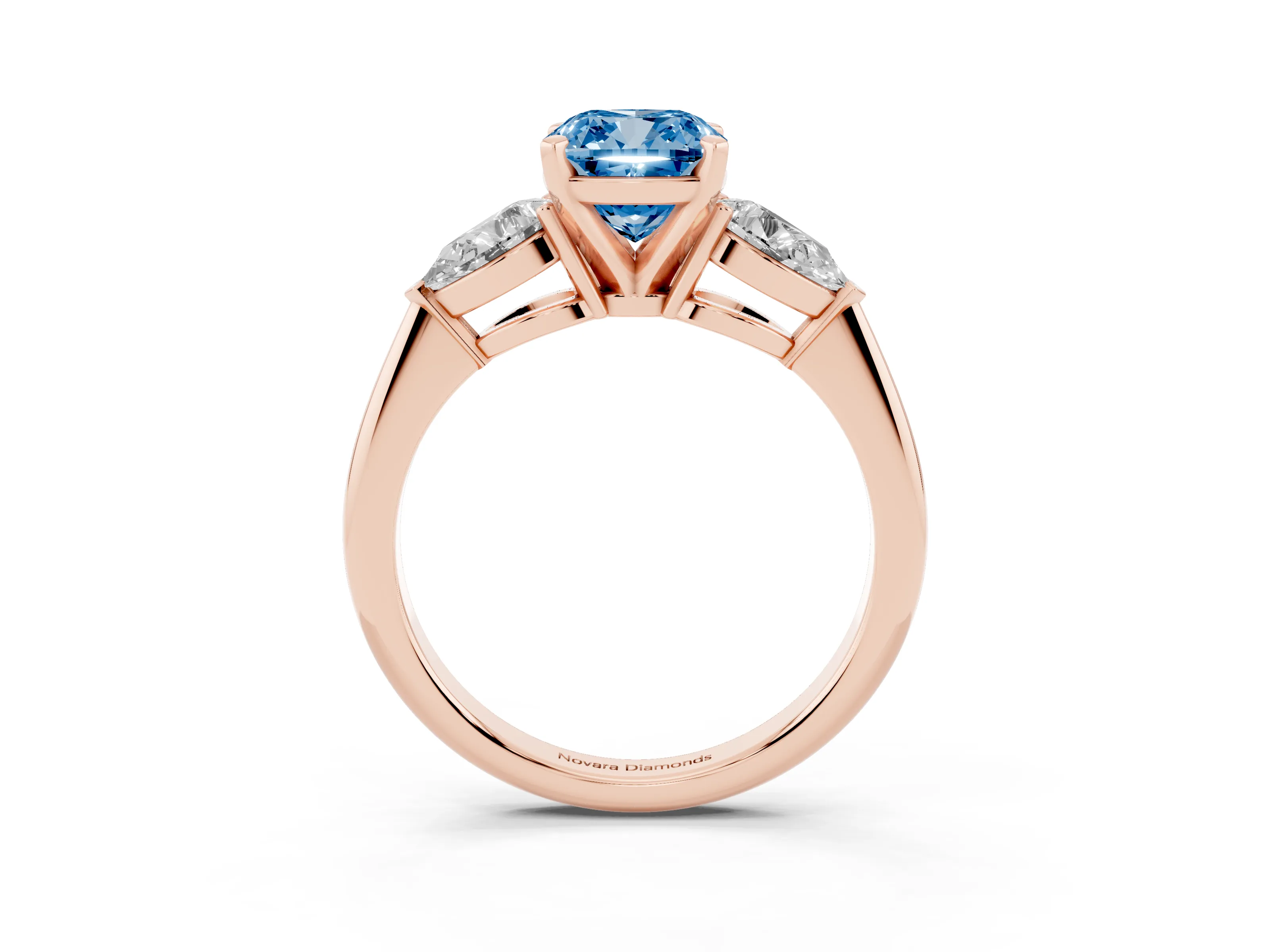 Fancy Blue Three-Stone Cushion Cut Diamond Ring Set in Rose gold with Pear Side Stones and Prong Setting