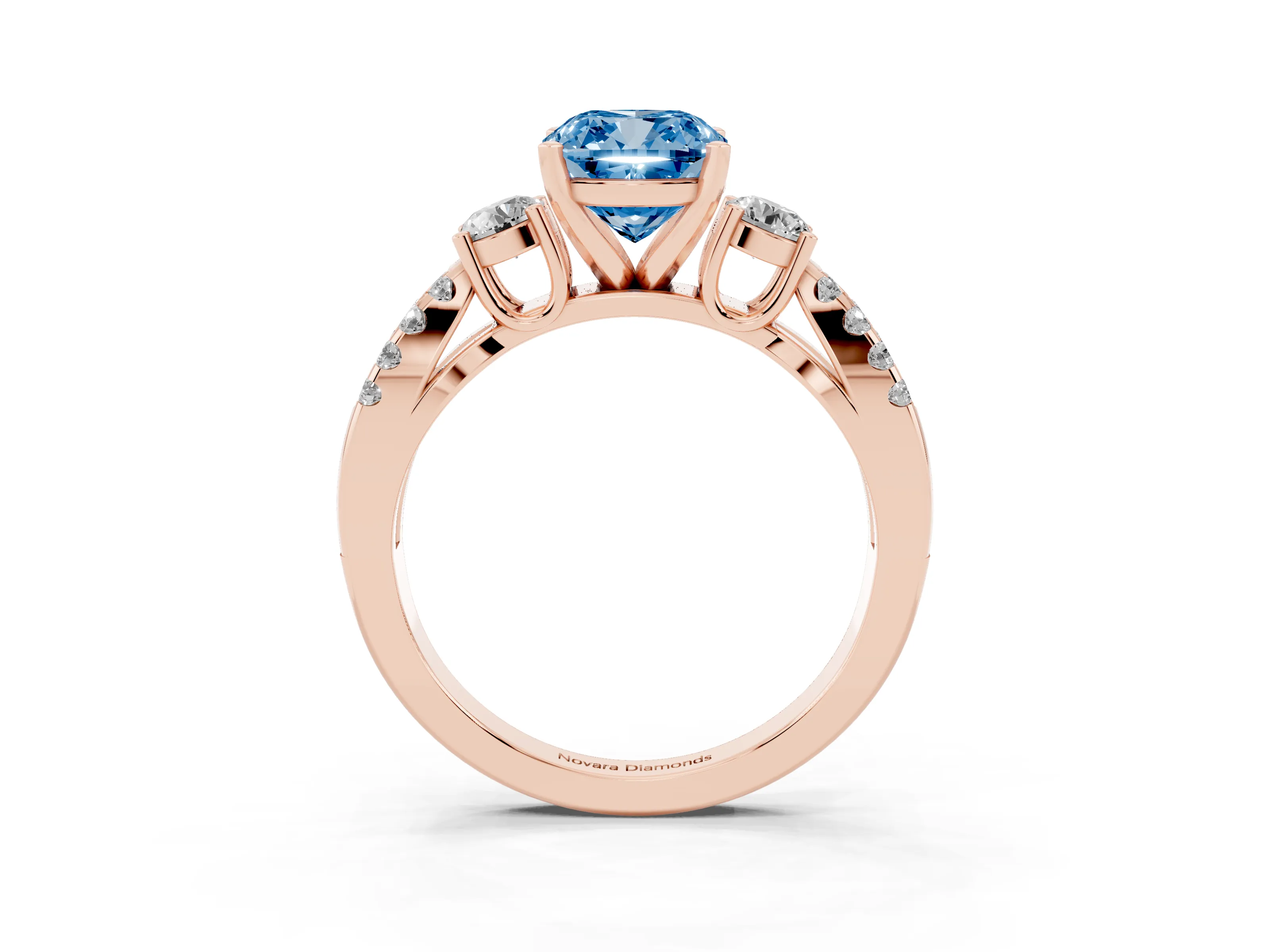 Fancy Blue Cushion Cut Diamond Three-Stone Ring Set in Rose gold with Pavé Split Shank and Prong Setting