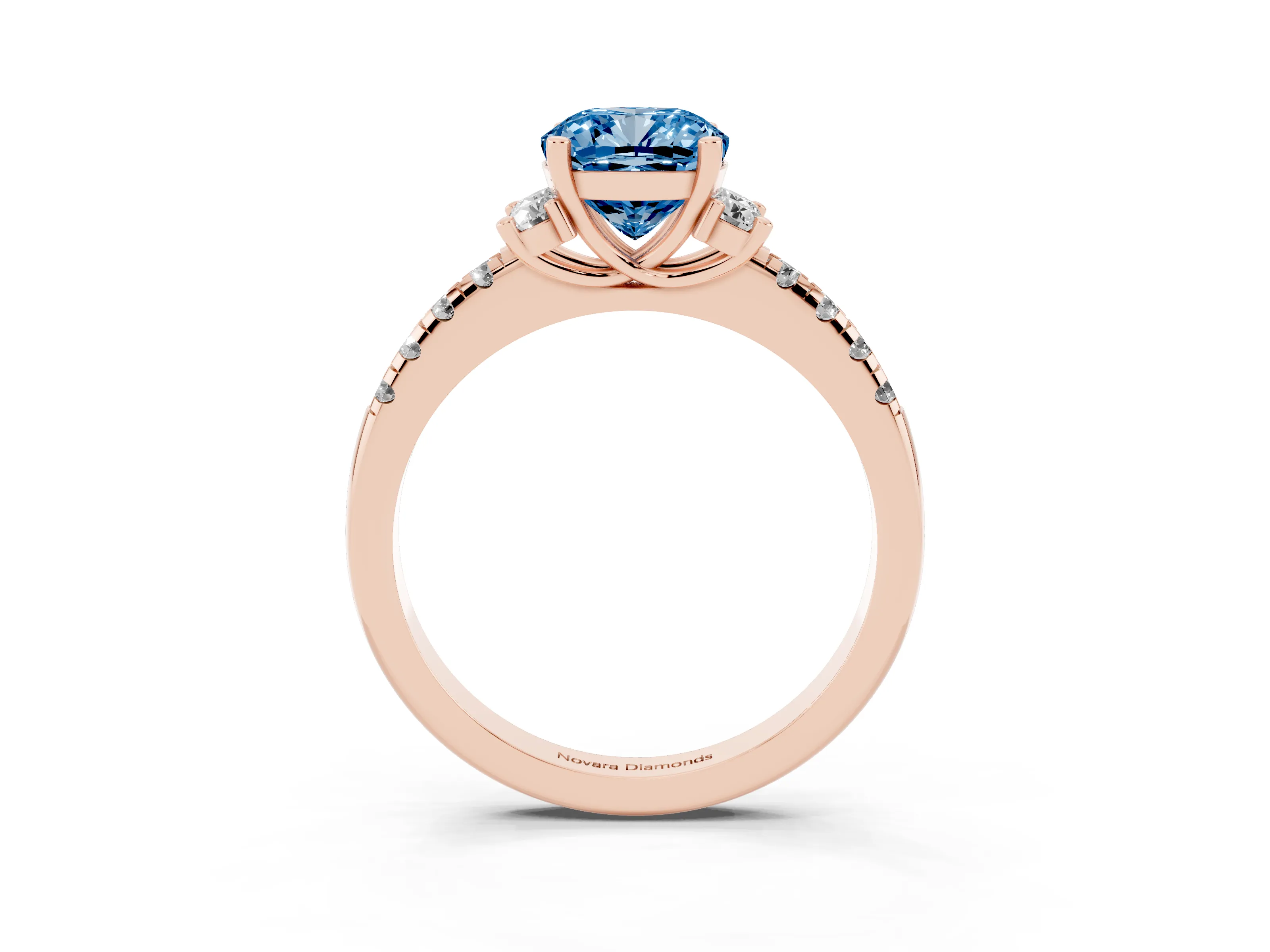 Fancy Blue Cushion Cut Diamond Three-Stone Pavé Ring Set in Rose gold with Prong Setting