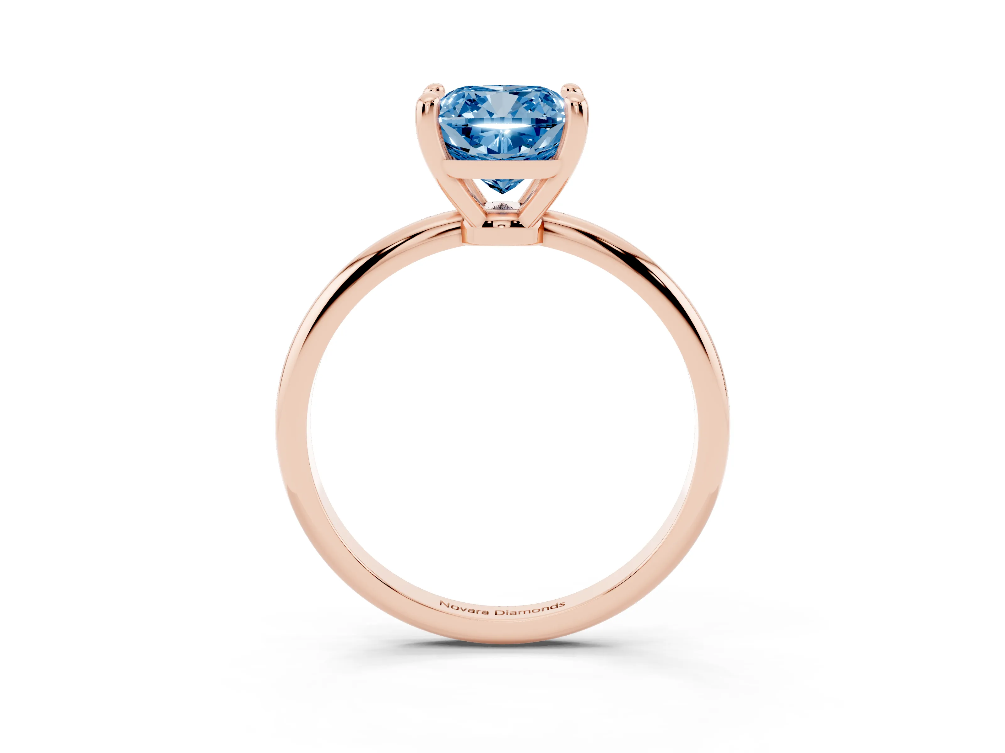 Fancy Blue Cushion Cut Diamond Solitaire Ring Set in Rose gold with Secure Prong Setting on a Classic Band