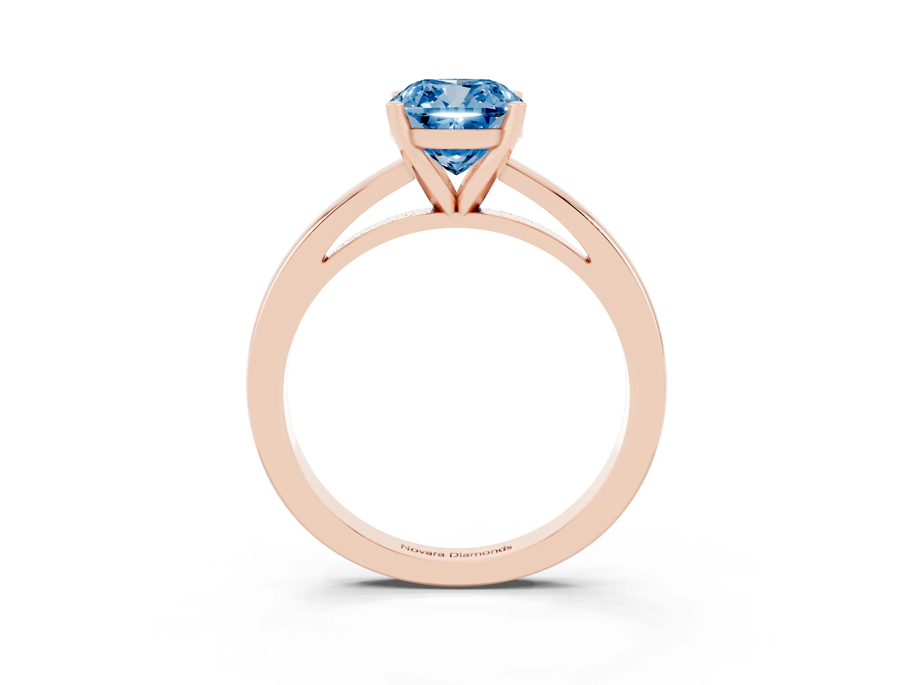 Fancy Blue Cushion Cut Diamond Solitaire Engagement Ring Set in Rose gold with Prong Setting on a Classic Band