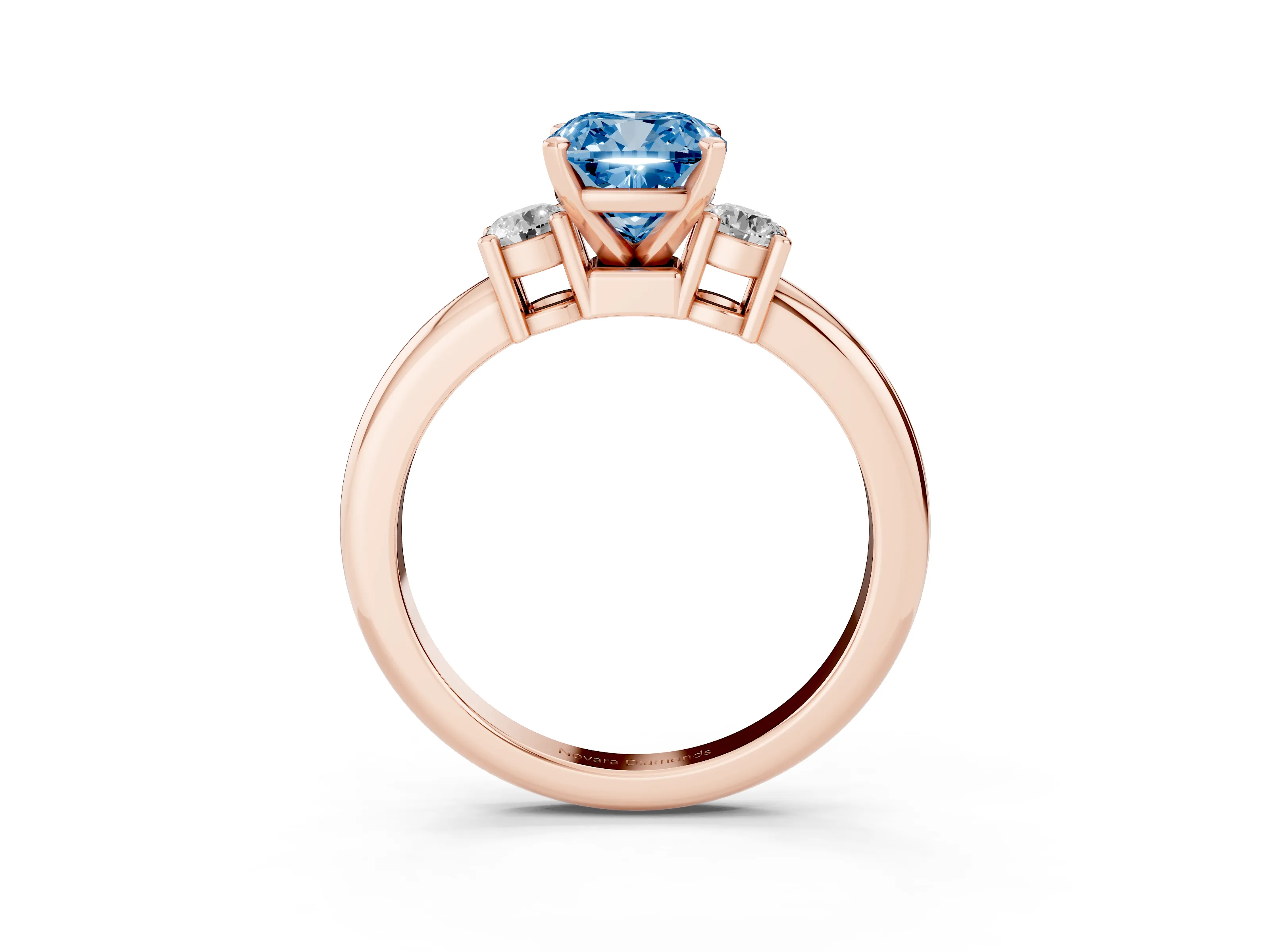 Fancy Blue Three-Stone Cushion Cut Diamond Ring Set in Rose gold with Prong Setting and Plain Band