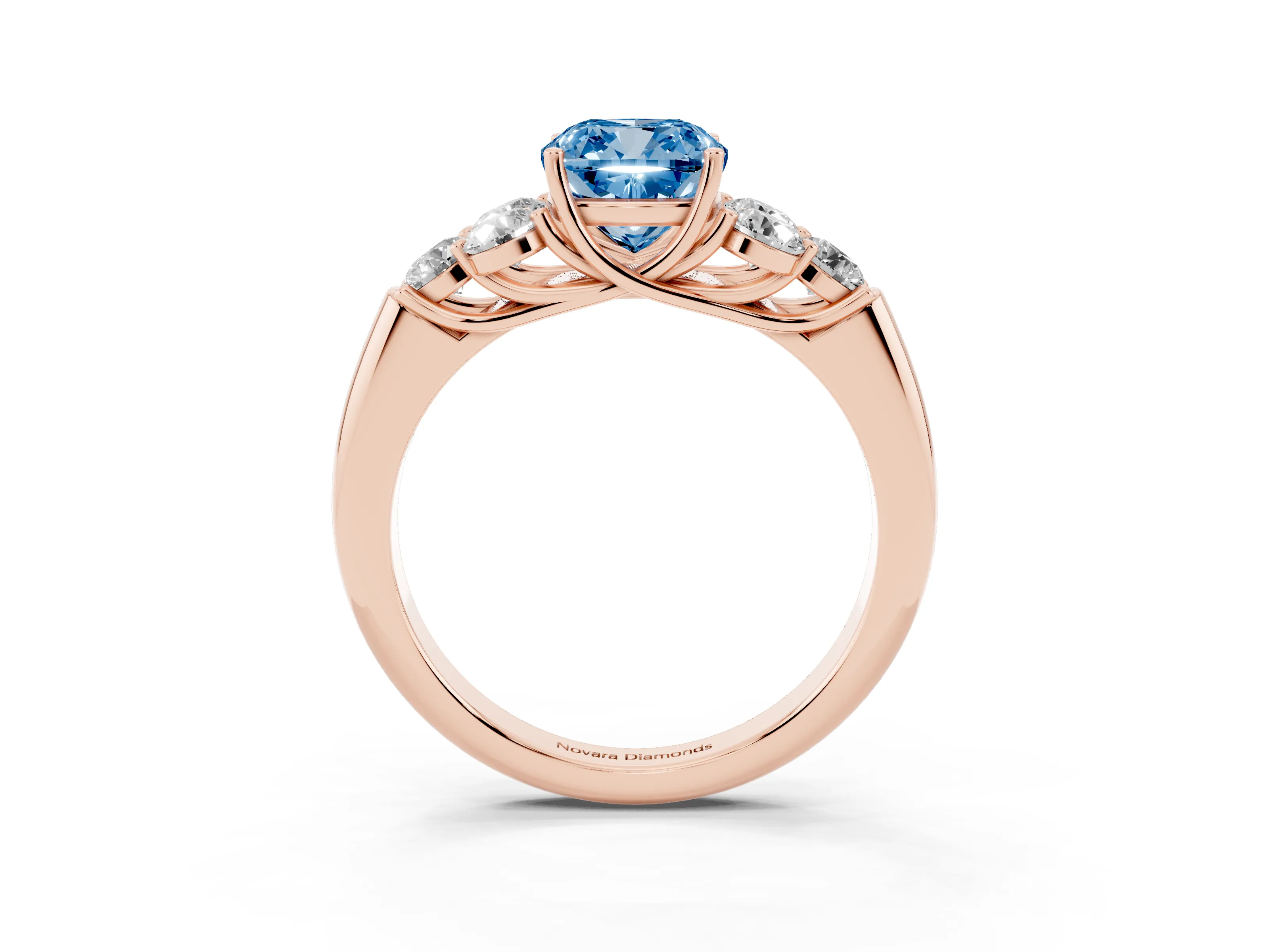 Fancy Blue Cushion Cut Diamond Cluster Ring Set in Rose gold with Round Accent Stones and Prong Setting on a Plain Band