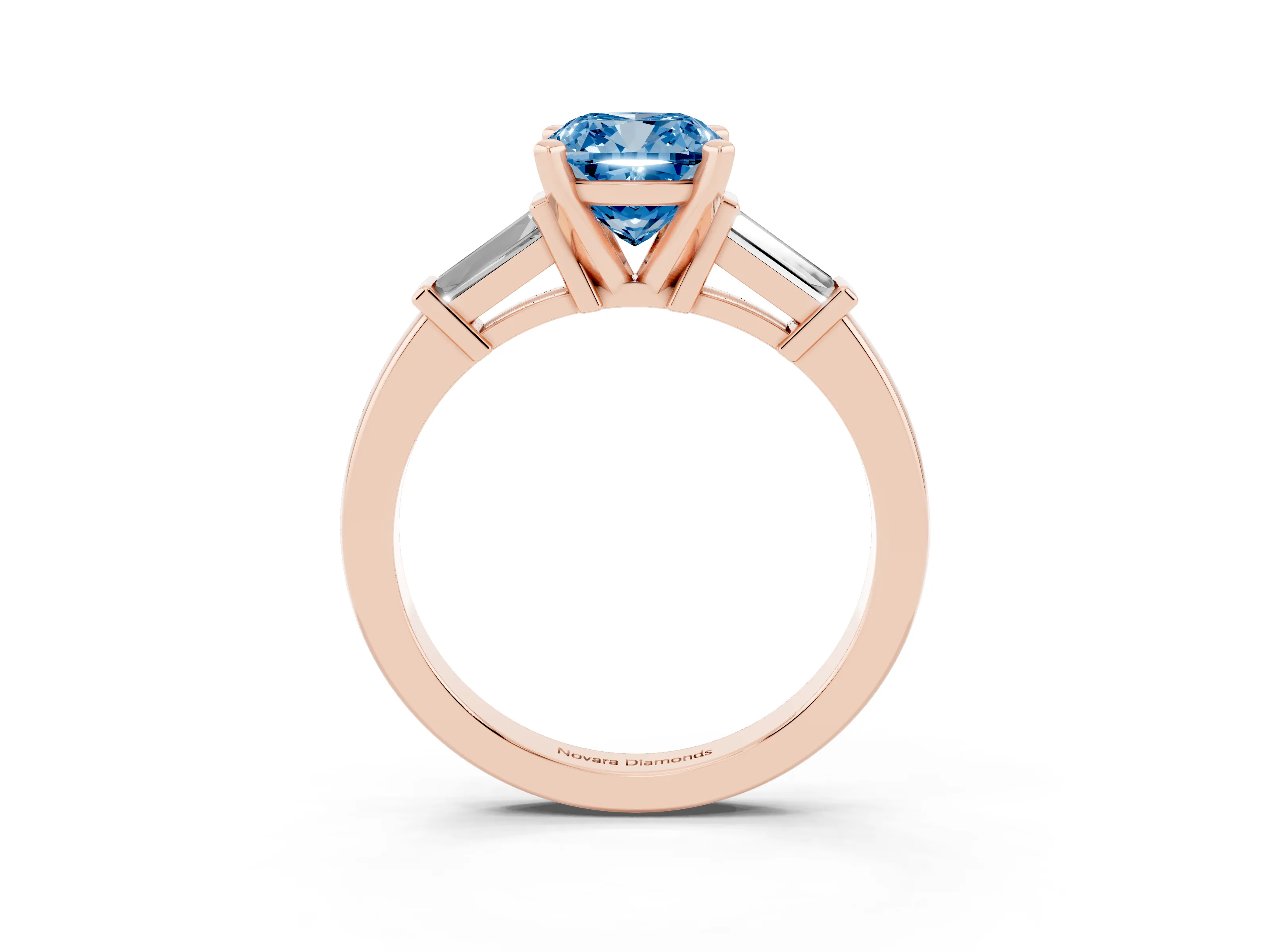 Fancy Blue Cushion Cut Diamond Solitaire Ring Set in Rose gold with Tapered Baguette Accents and Prong Setting