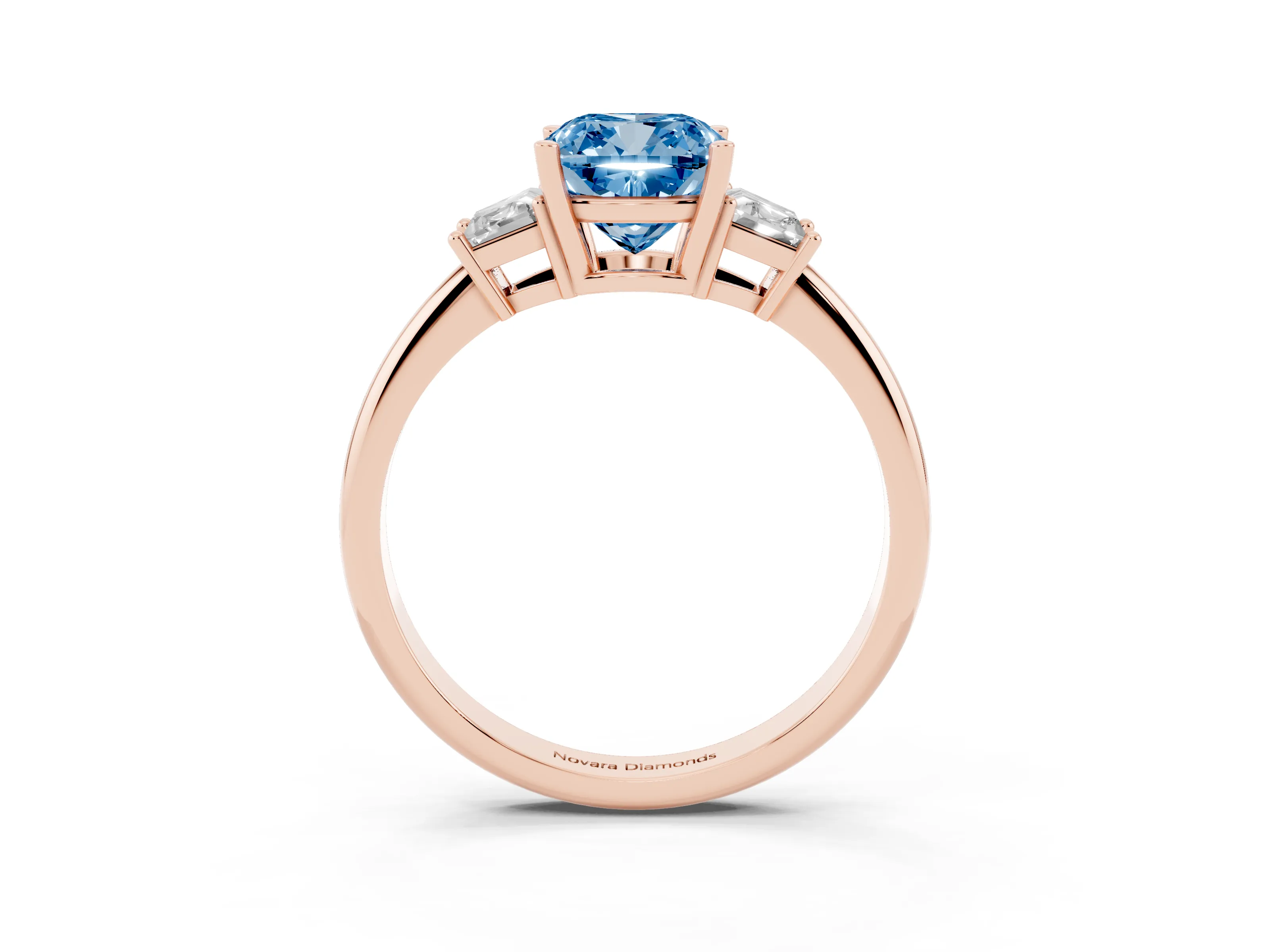 Fancy Blue Cushion Cut Diamond Three-Stone Ring Set in Rose gold with Trapezoid Side Stones and Prong Setting