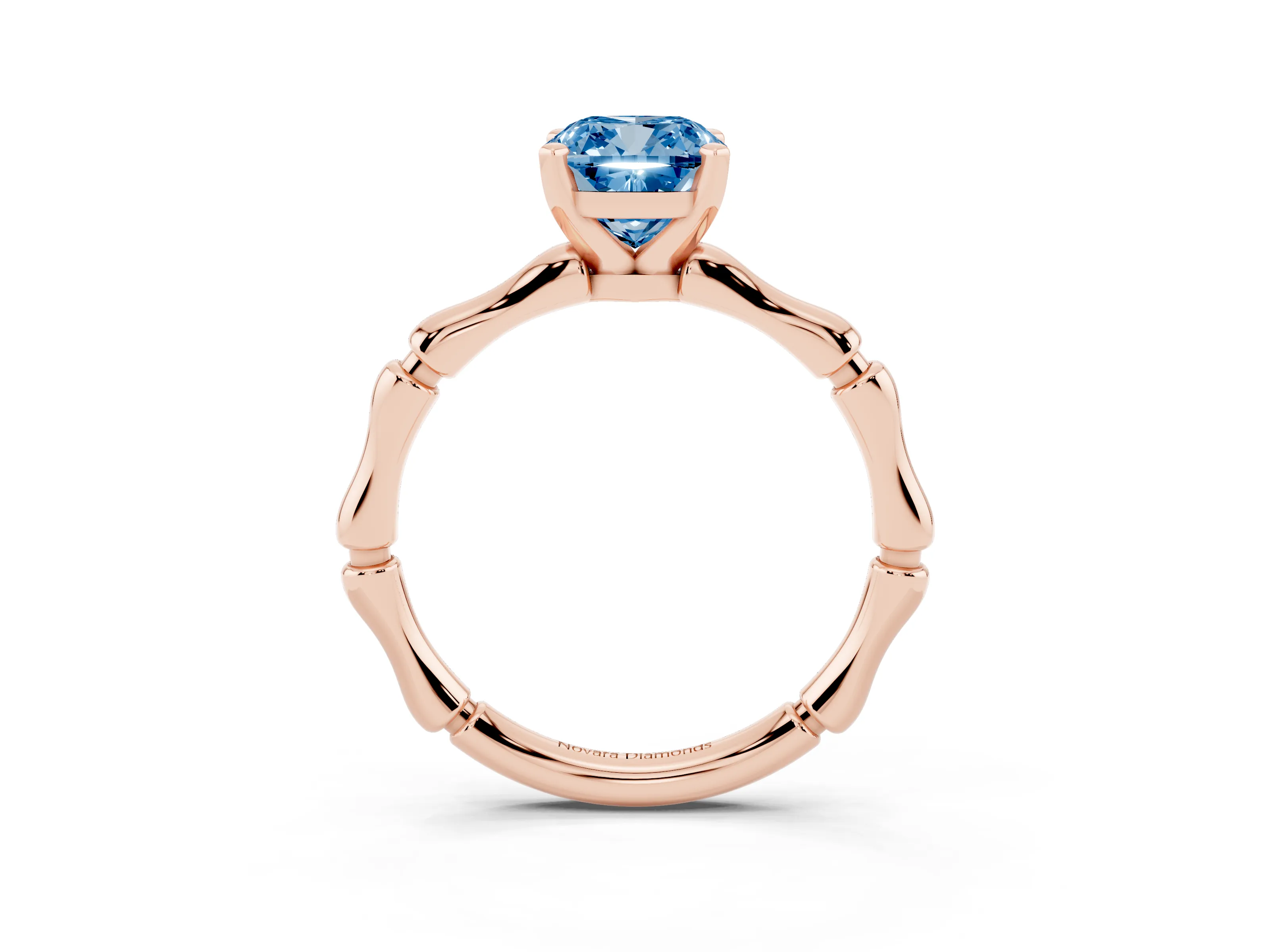 Fancy Blue Cushion Cut Diamond Solitaire Ring Set in Rose gold with Bamboo Band and Prong Setting