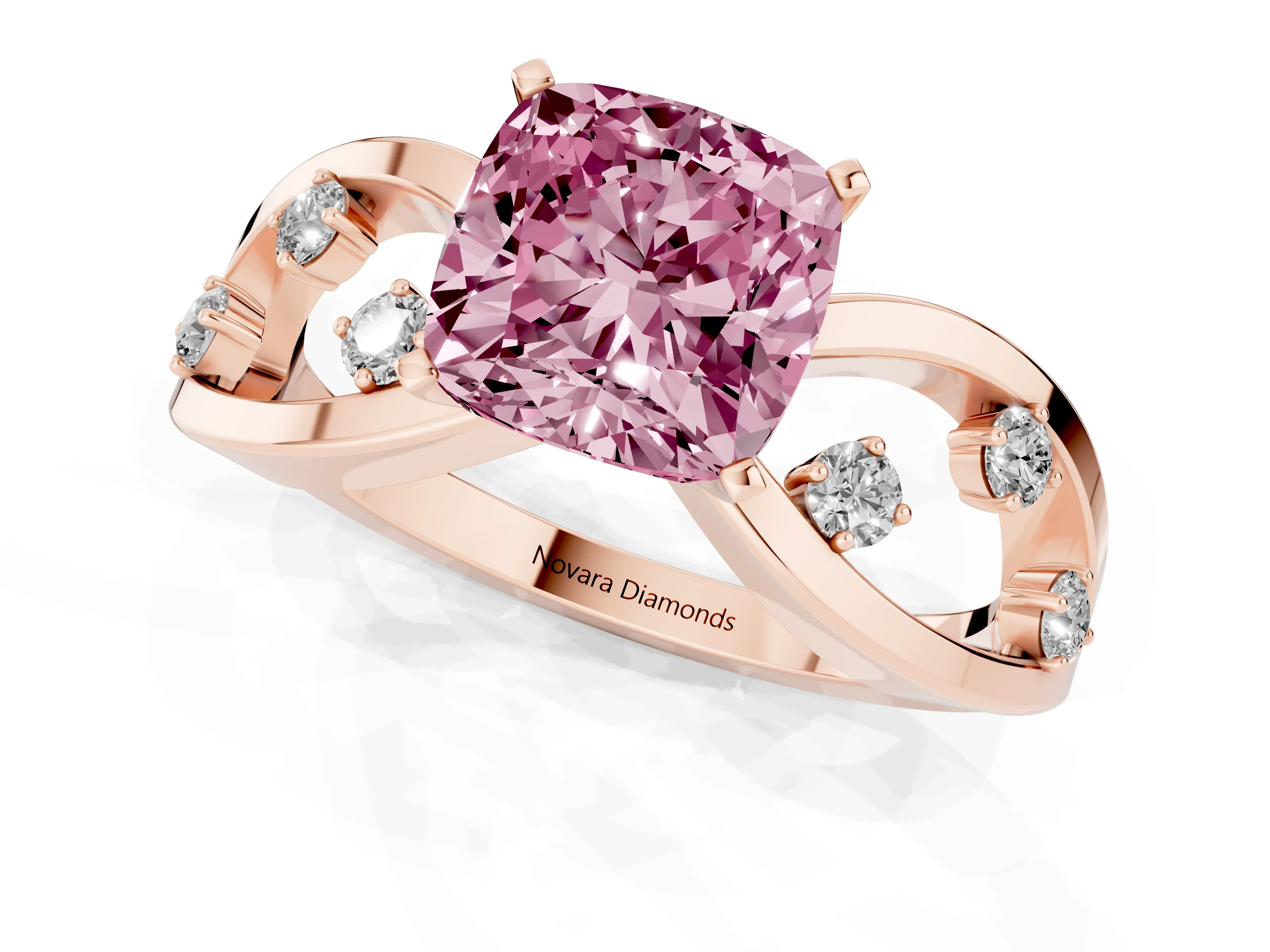 Fancy Pink Cushion Cut Diamond Solitaire Ring Set in Rose gold with Side Stones on Criss-Cross Band and Prong Setting