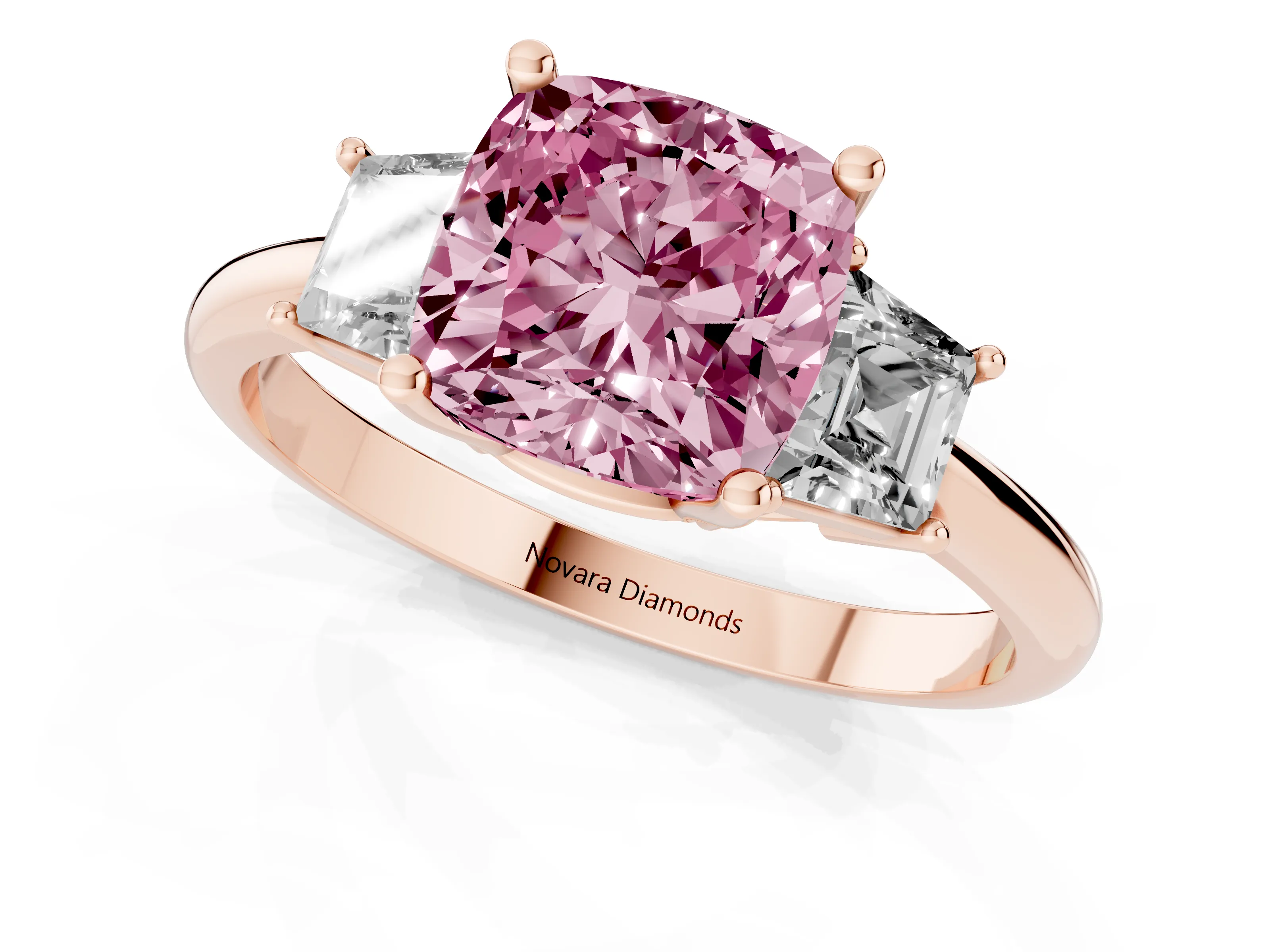 Fancy Pink Cushion Cut Diamond Three-Stone Ring Set in Rose gold with Trapezoid Side Stones and Prong Setting