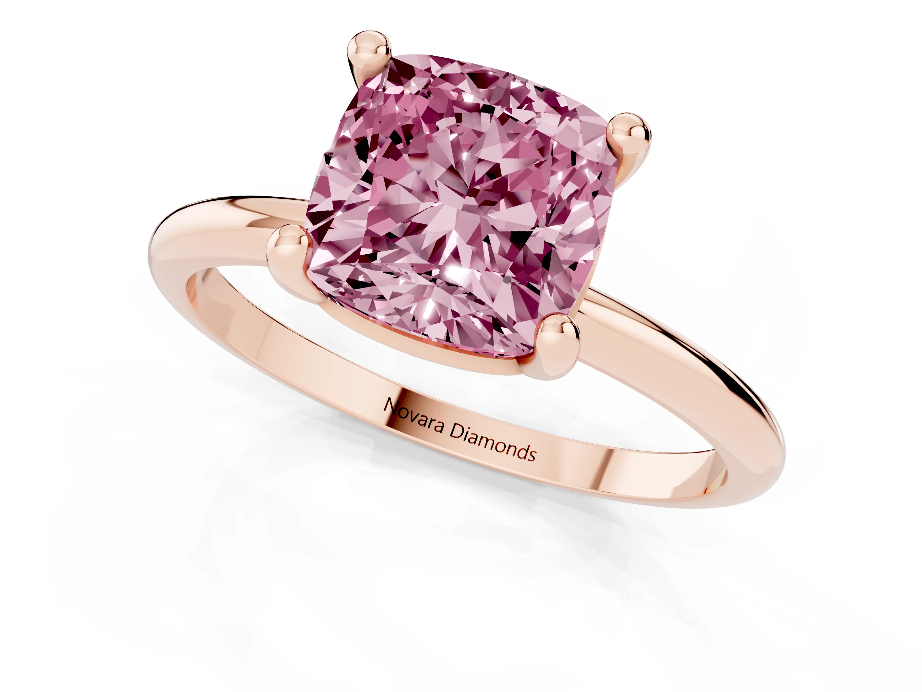 Fancy Pink Cushion Cut Diamond Solitaire Ring Set in Rose gold with Secure Prong Setting on a Classic Band