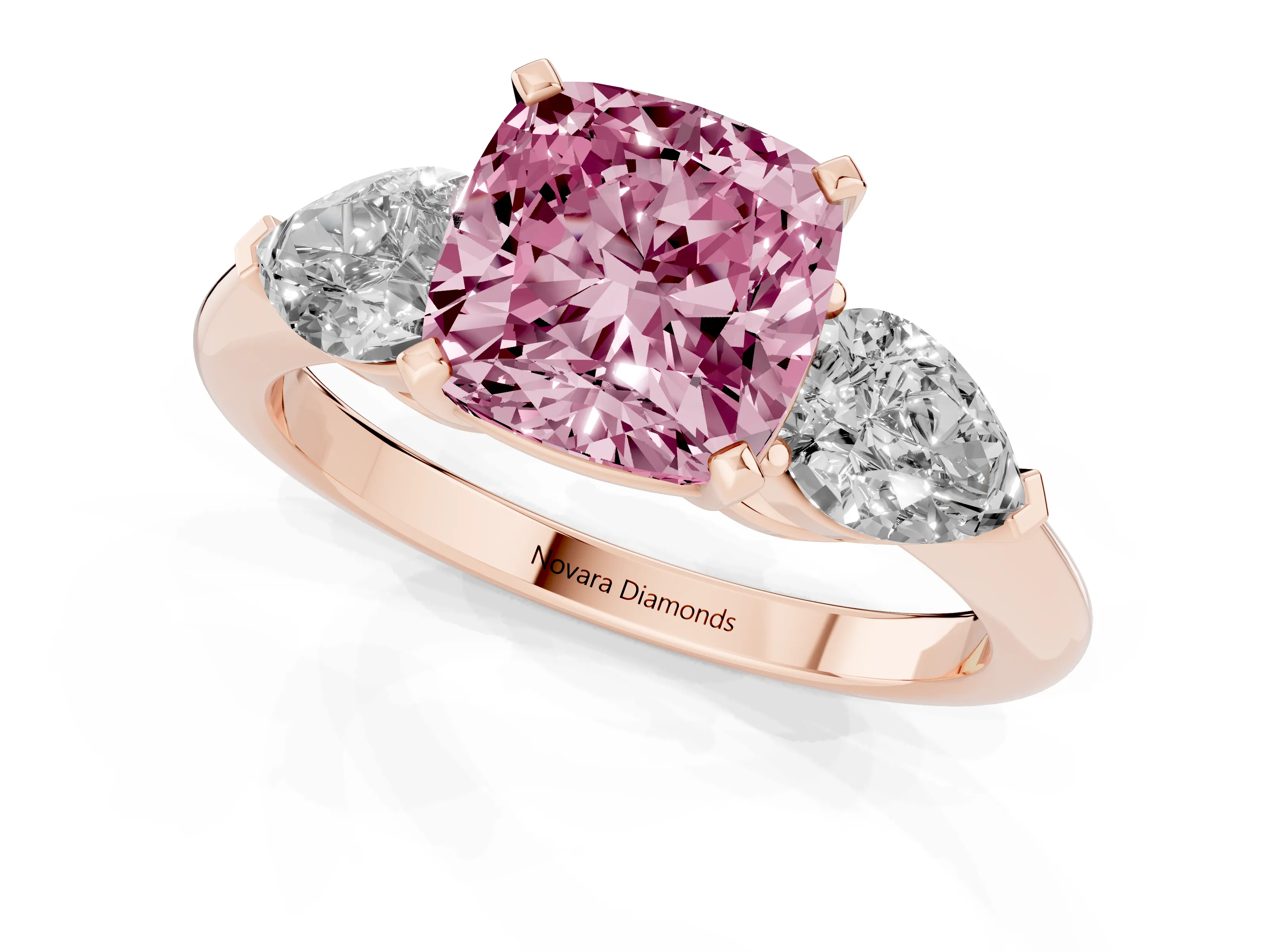 Fancy Pink Three-Stone Cushion Cut Diamond Ring Set in Rose gold with Pear Side Stones and Prong Setting