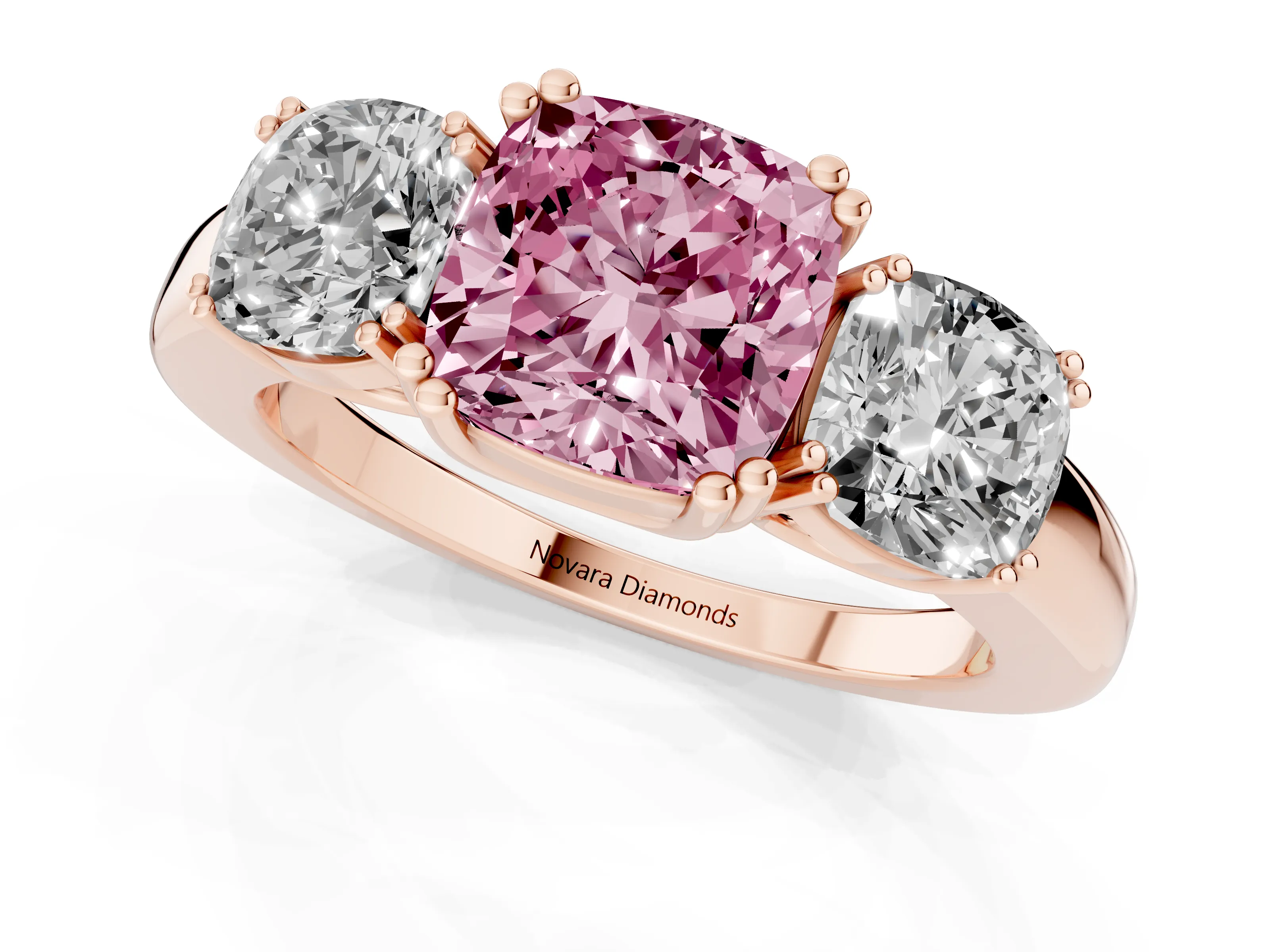 Fancy Pink Cushion Cut Diamond Three-Stone Ring Set in Rose gold with Polished Band and Prong Setting