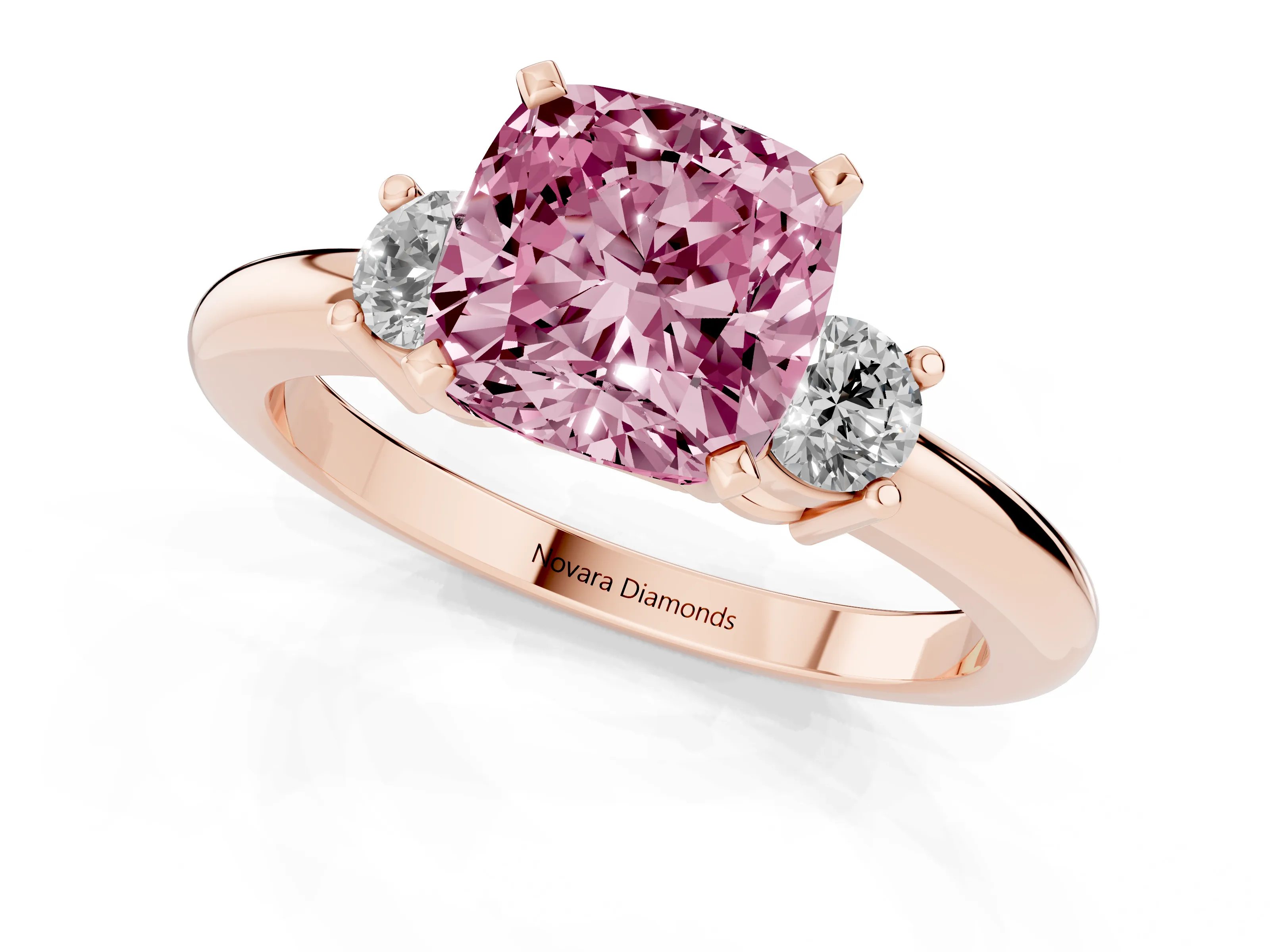 Fancy Pink Three-Stone Cushion Cut Diamond Ring Set in Rose gold with Prong Setting and Plain Band