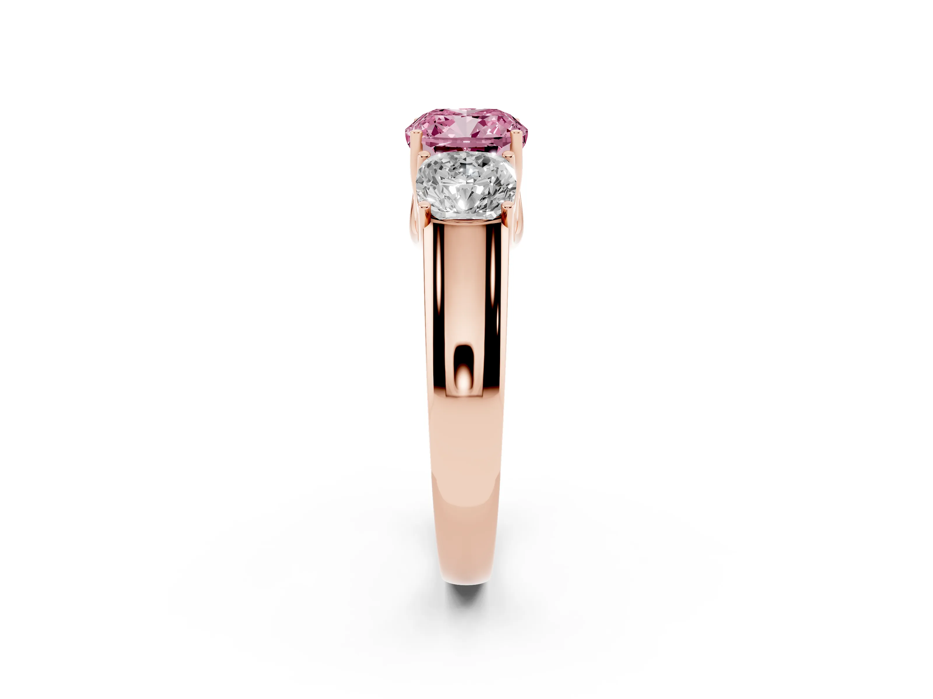 Fancy Pink Three-Stone Cushion Cut Diamond Ring Set in Rose gold with Matching Prong Settings and Plain Band