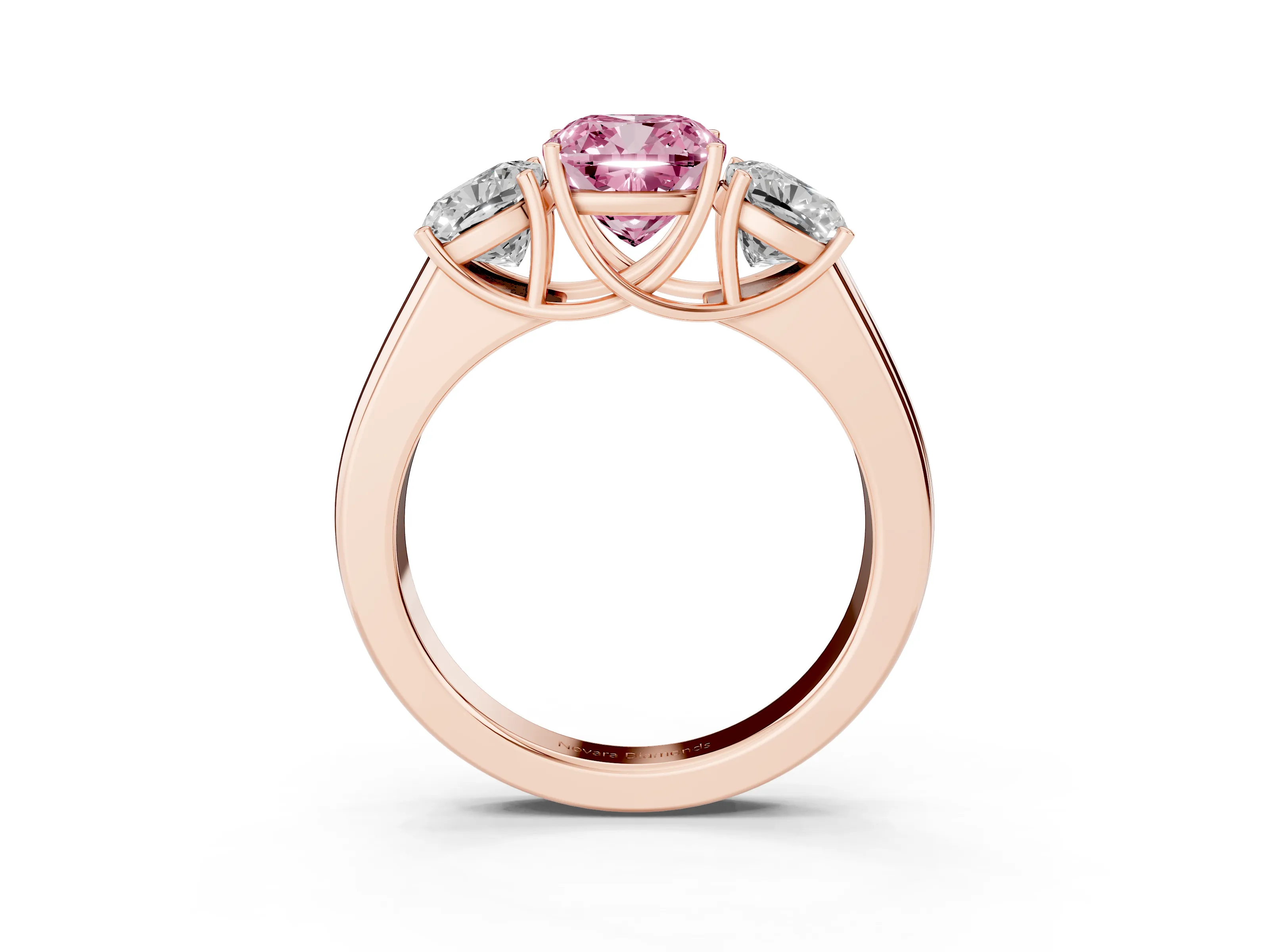 Fancy Pink Three-Stone Cushion Cut Diamond Ring Set in Rose gold with Matching Prong Settings and Plain Band