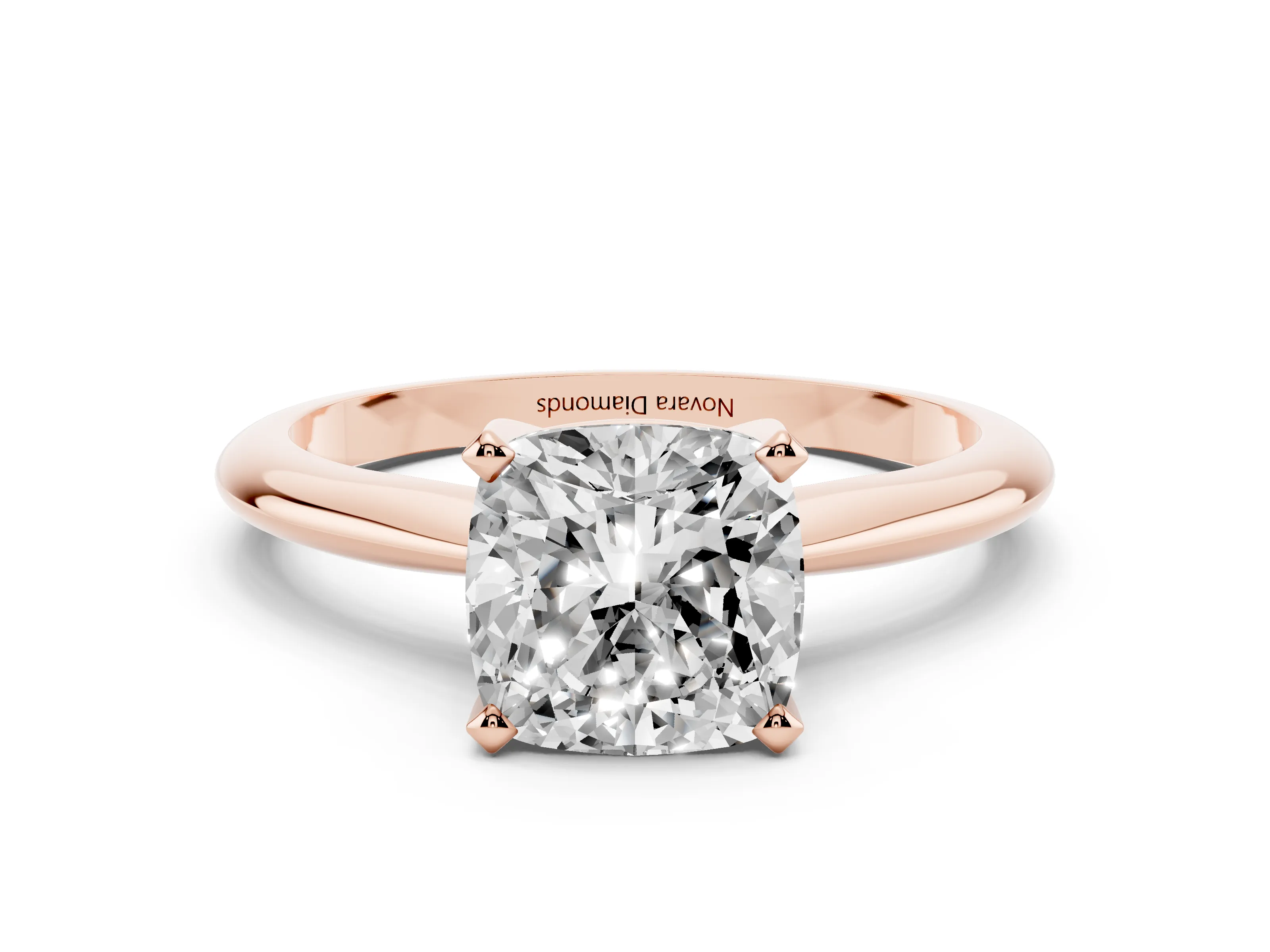 Cushion Cut Diamond Solitaire Ring Set in Rose gold with Prong Setting on a Plain Round Band