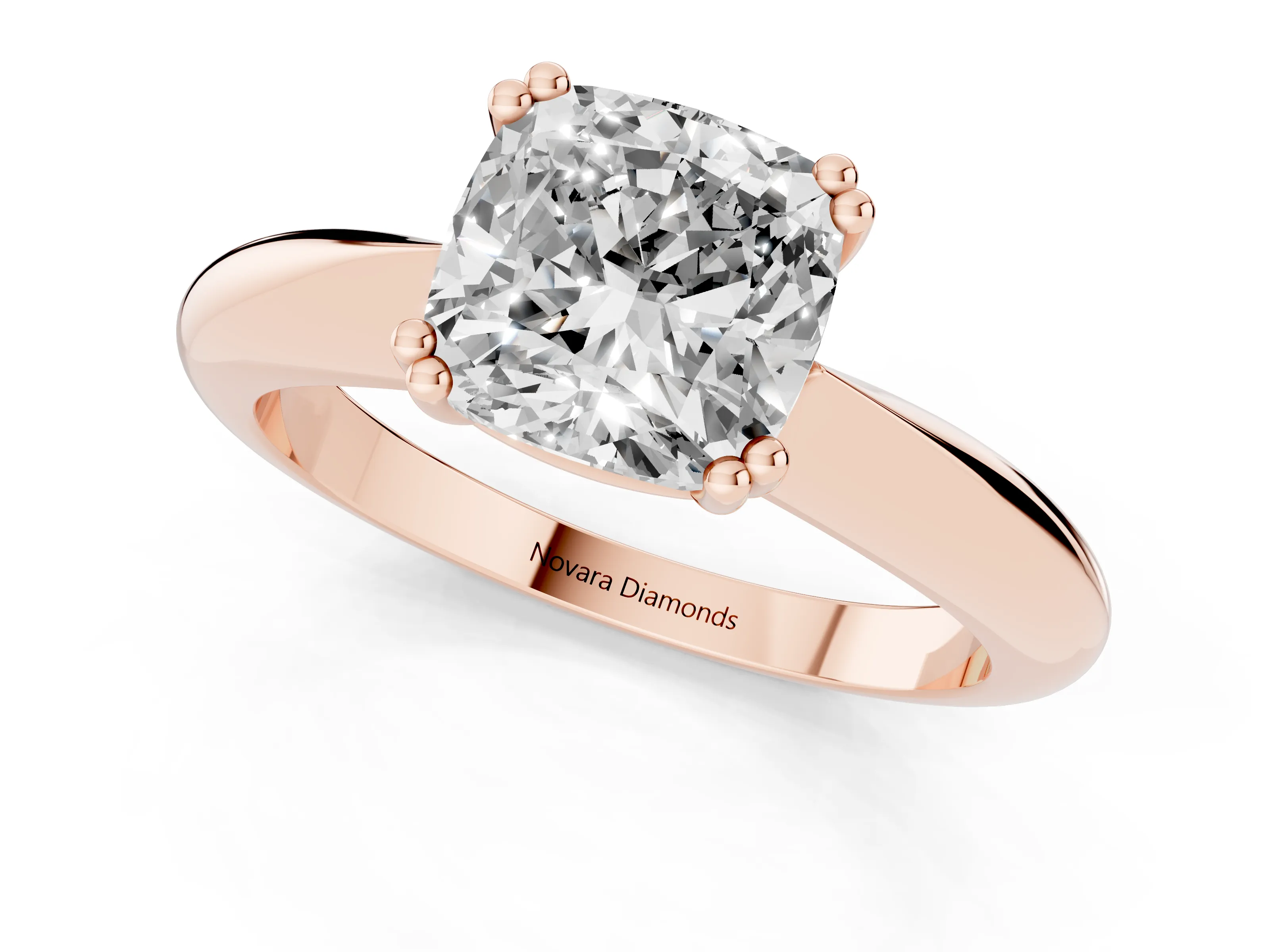 Cushion Cut Diamond Solitaire Engagement Ring Set in Rose gold with Tapered Band and Prong Setting