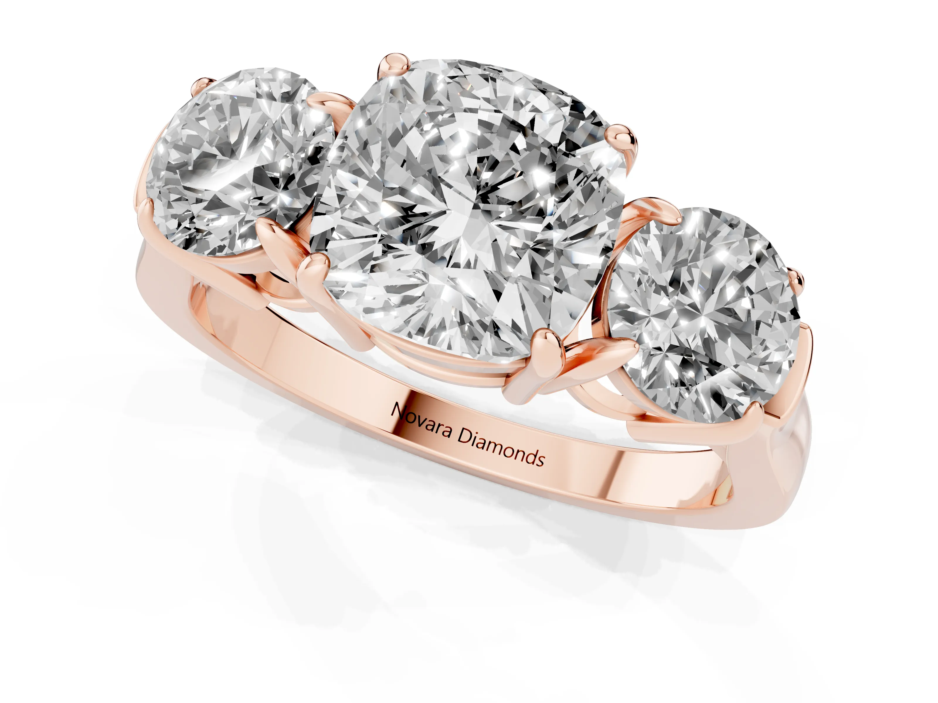Cushion Cut Diamond Three-Stone Ring Set in Rose gold with Round Accent Stones and Plain Band