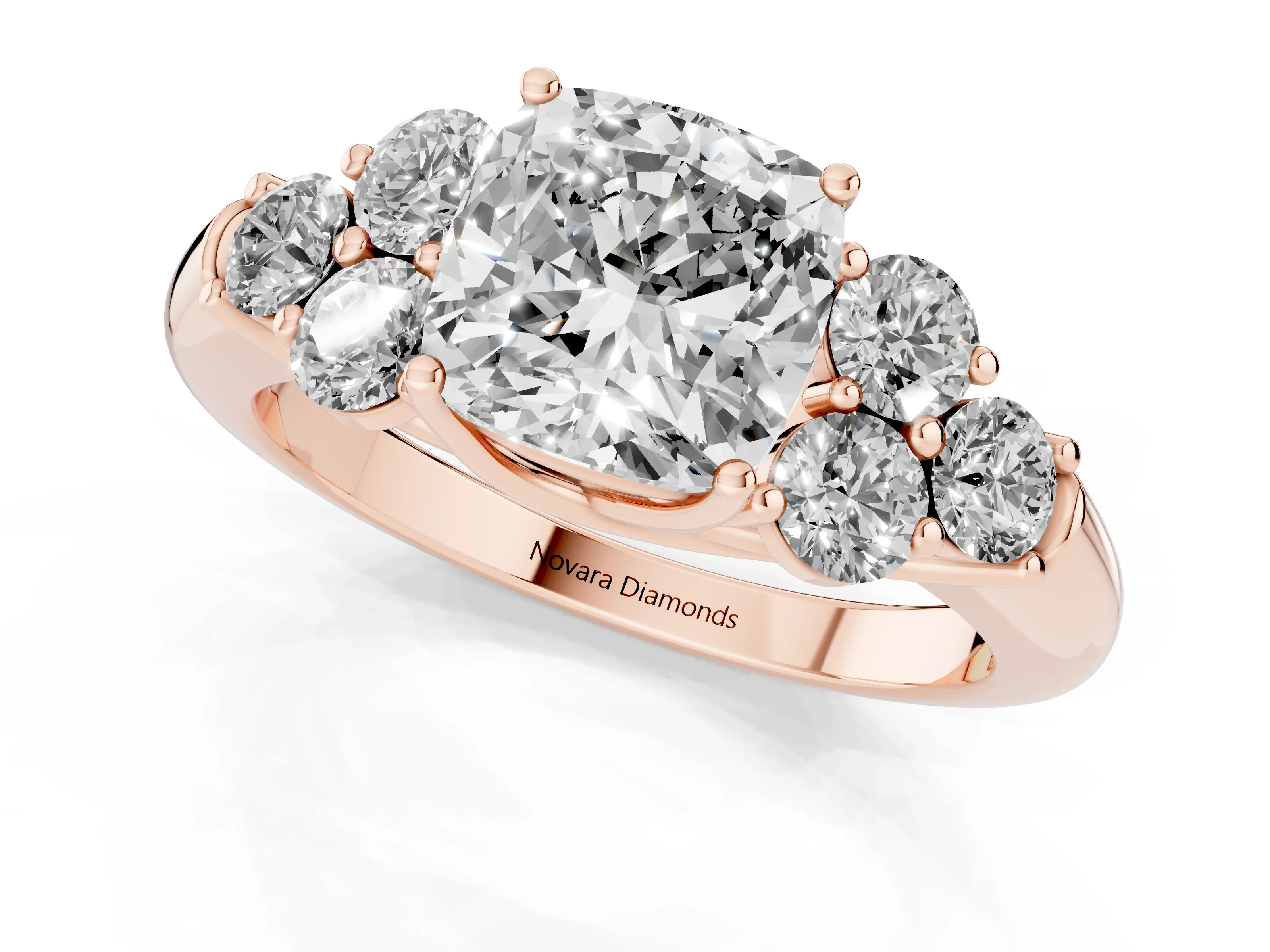 Cushion Cut Diamond Cluster Ring Set in Rose gold with Round Accent Stones and Prong Setting on a Plain Band
