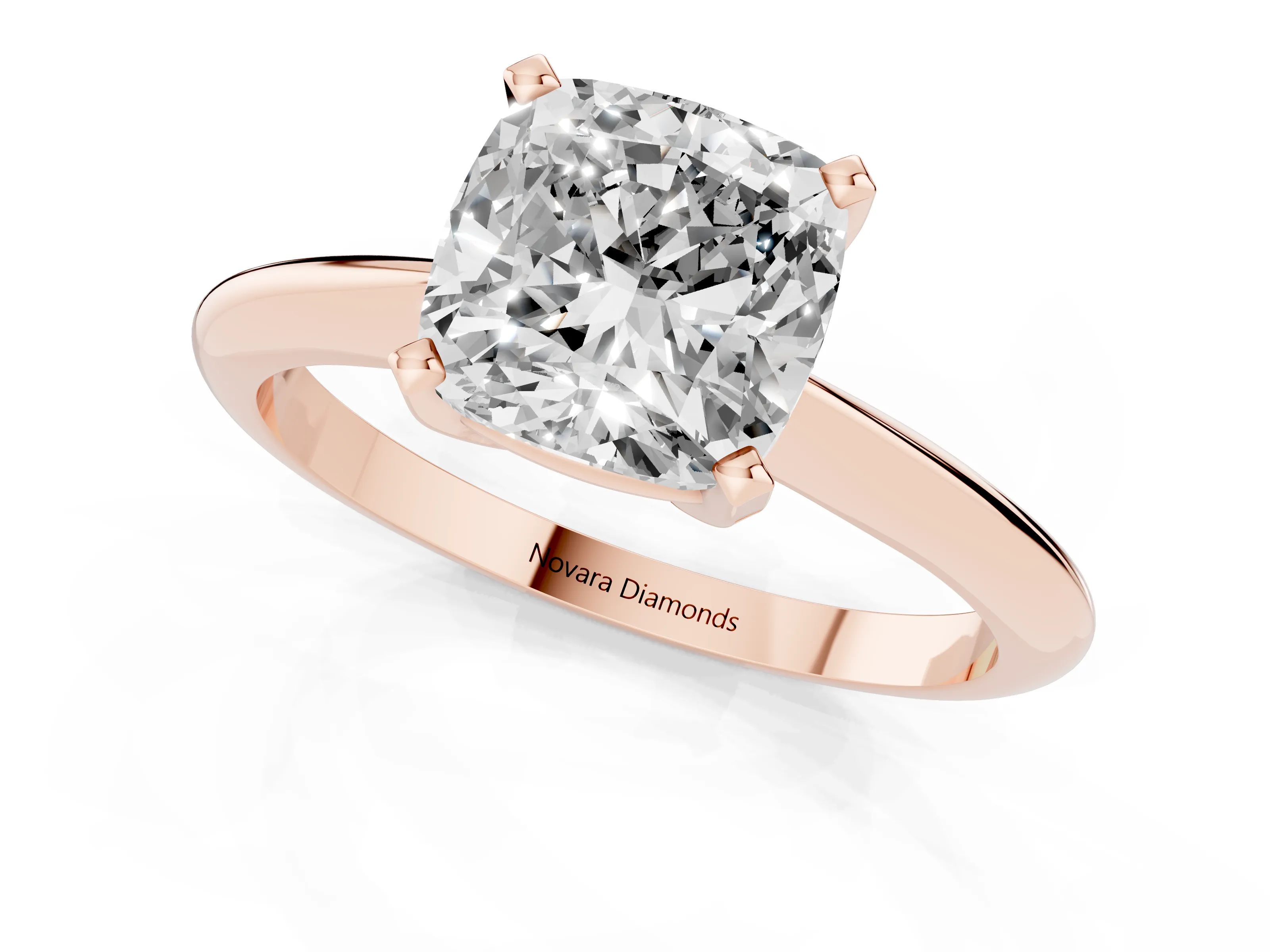 Cushion Cut Diamond Solitaire Ring Set in Rose gold with Prong Setting on a Plain Round Band