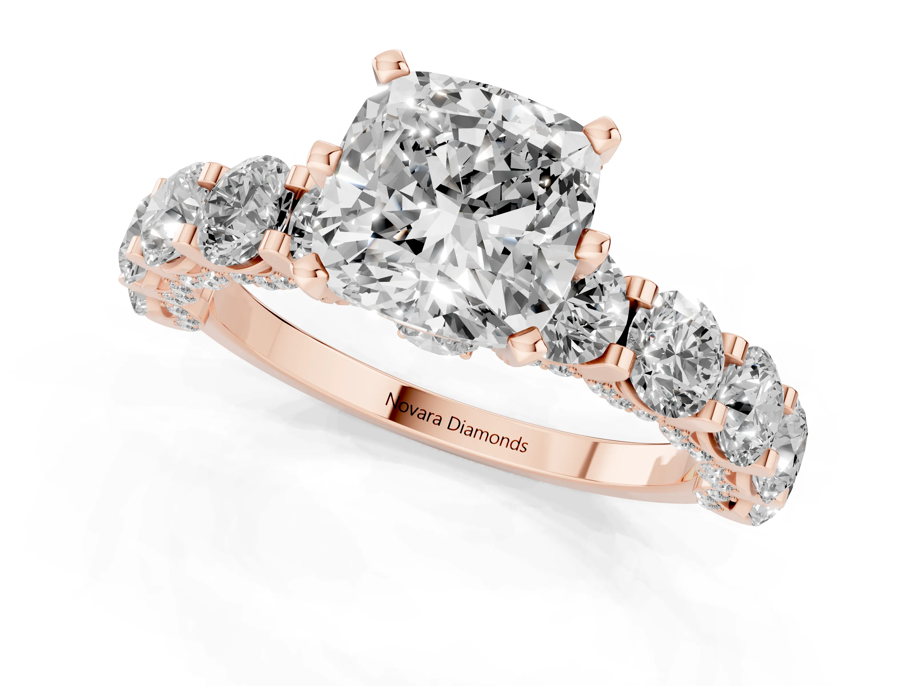 Cushion Cut Diamond Side Stone Ring Set in Rose gold with Alternating Round and Oval Side Stones
